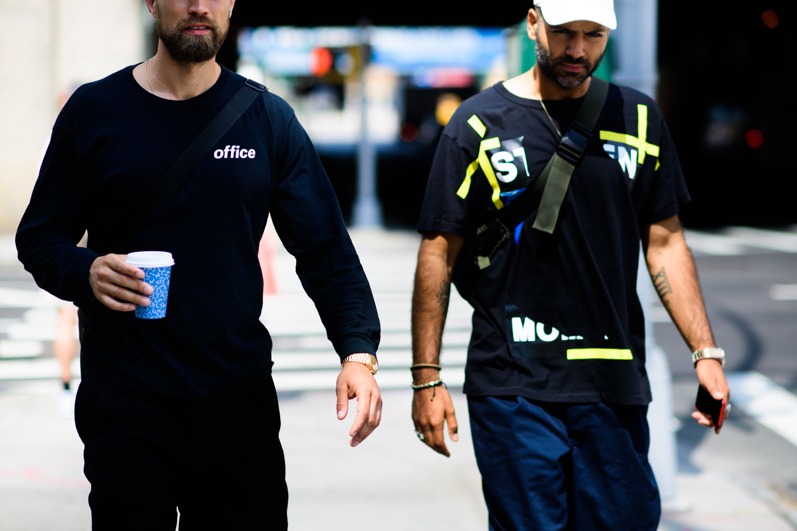 Two stylists wearing dark blue