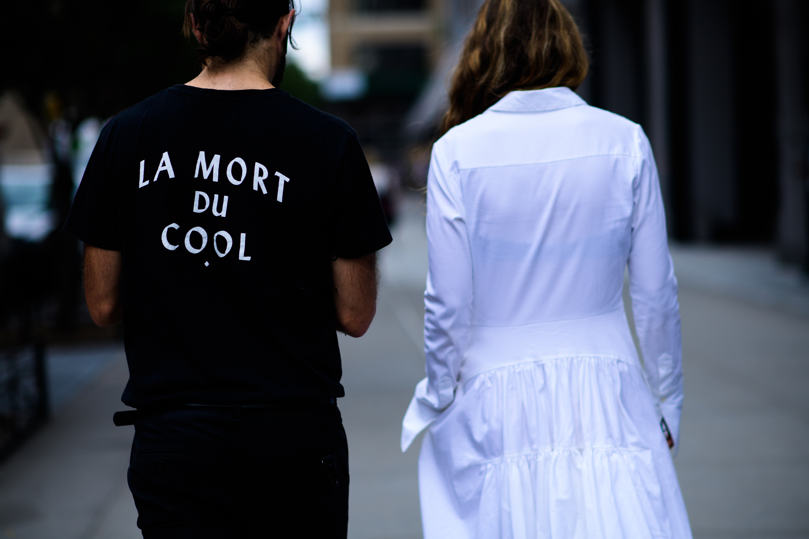 Man and women wearing black and white