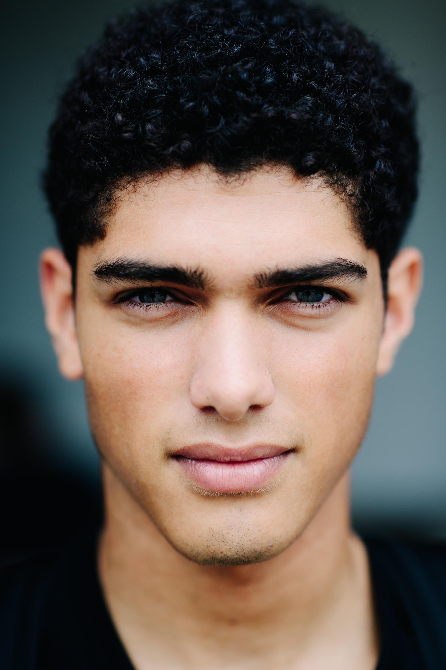 Portrait of male model with curly hair