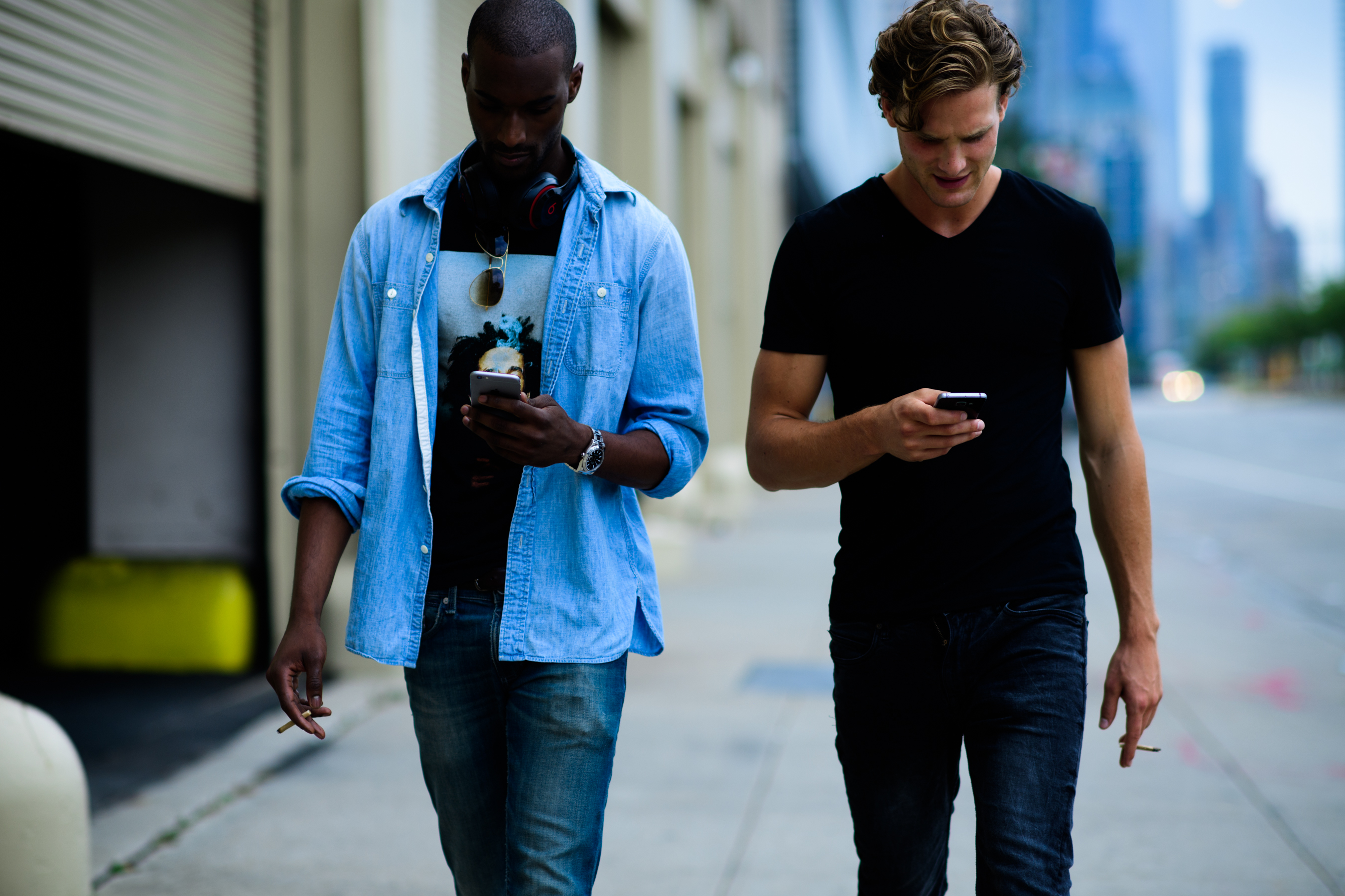 Two male models after the show