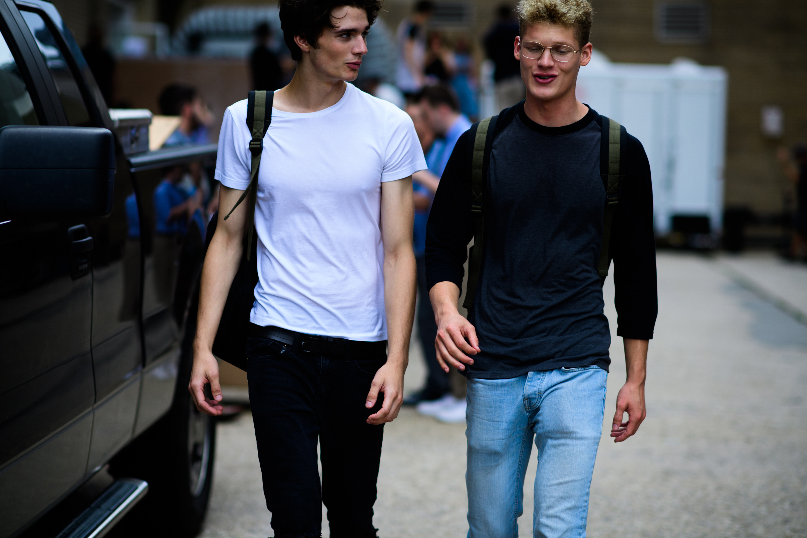 Two male models after the show