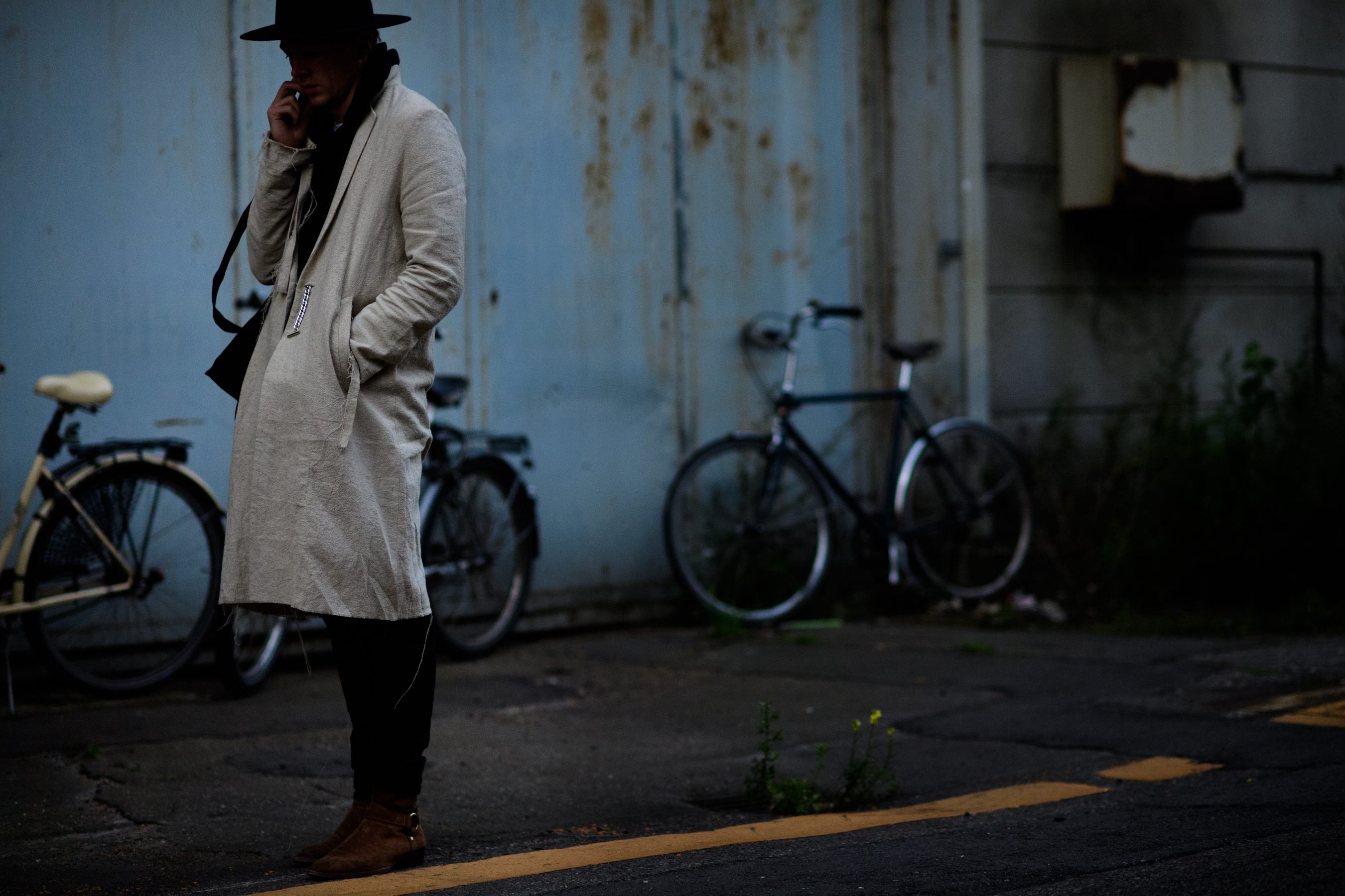 Man wearing beige coat