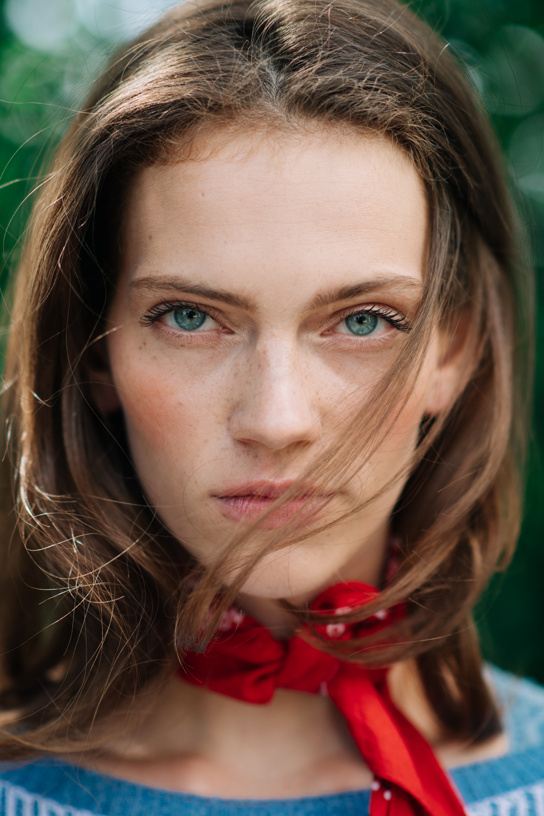Portrait of beautiful girl red scarf