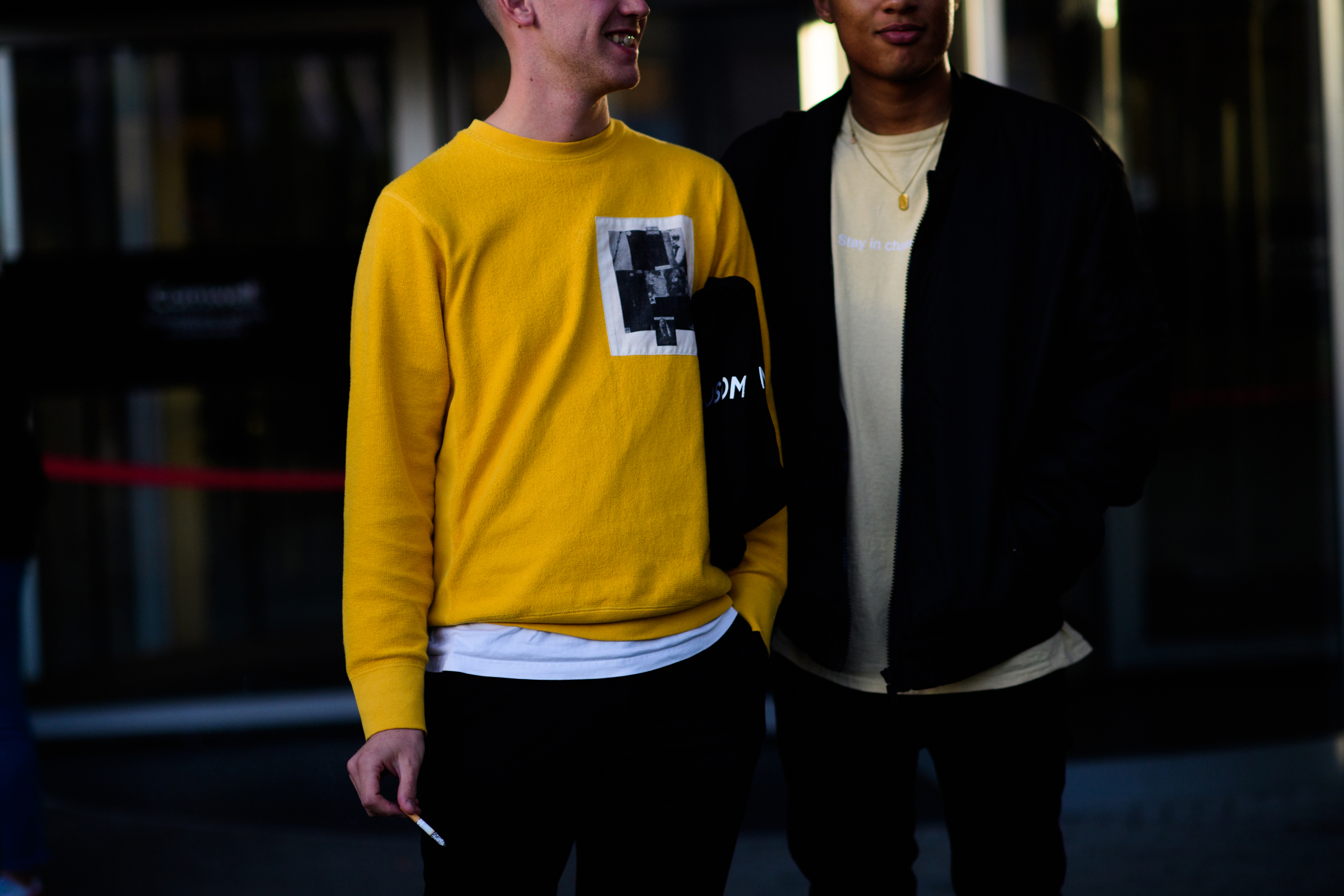 Two men smoking after the show