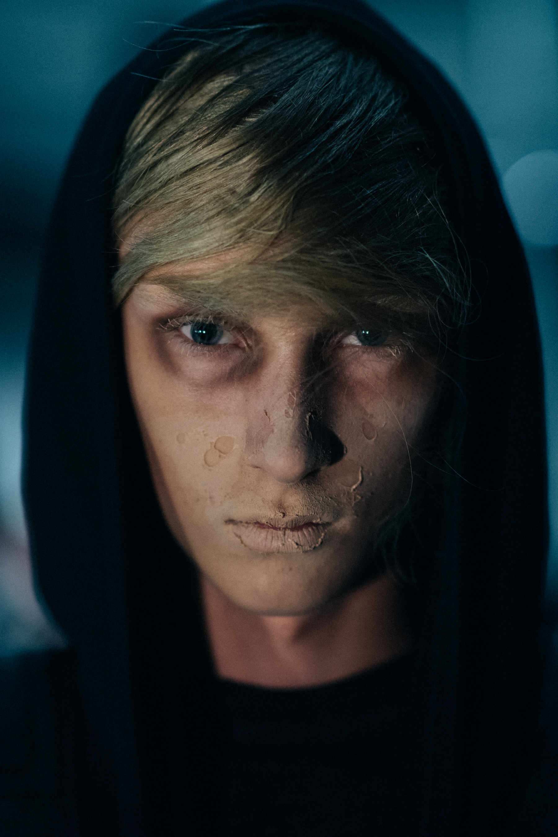 Portrait of male model creepy make up