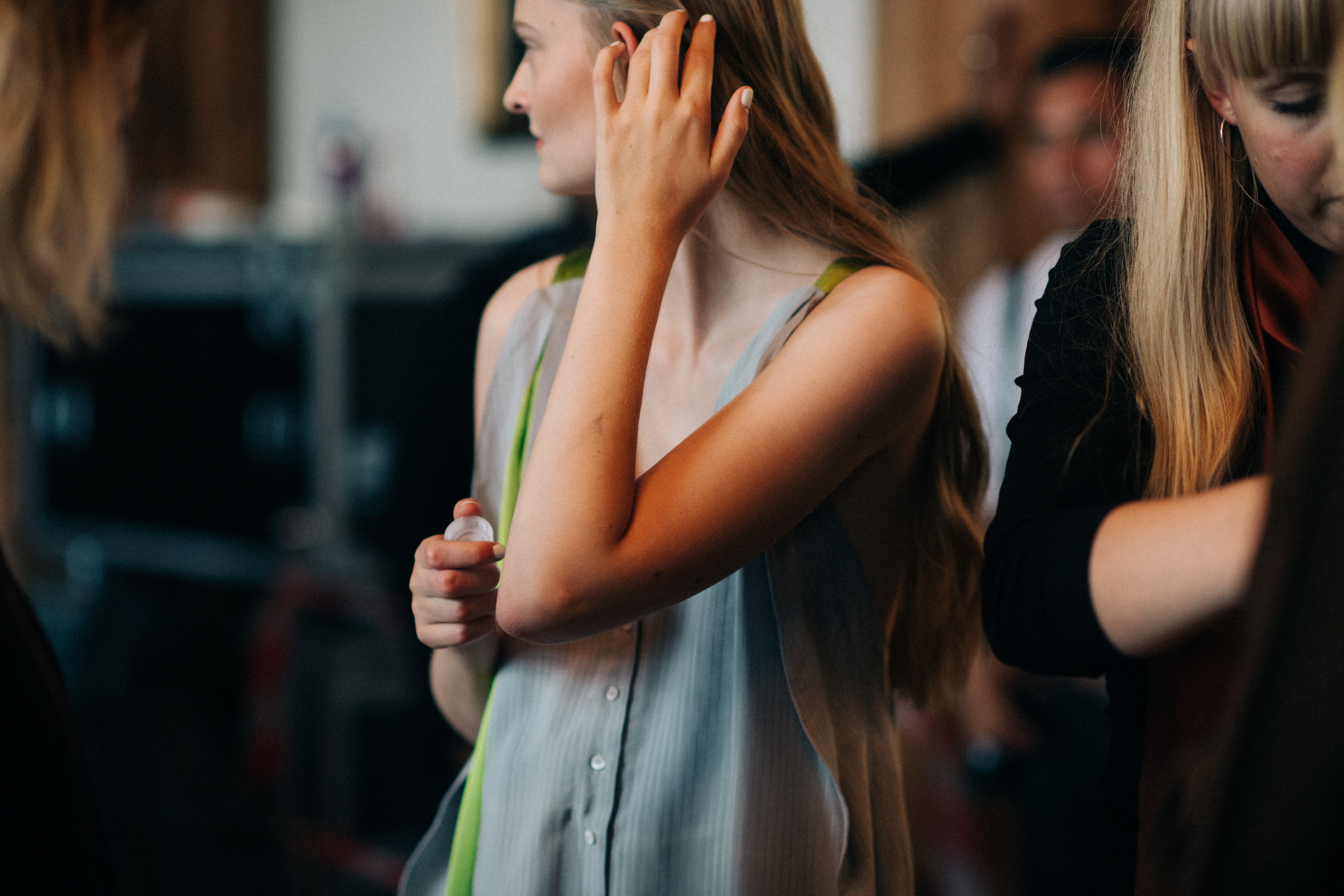 Model wearing dress before the show