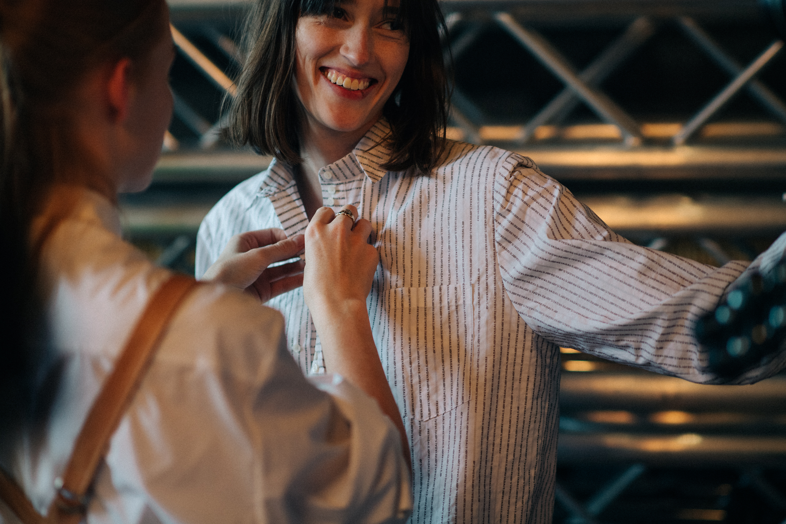 Model wearing shirt before show