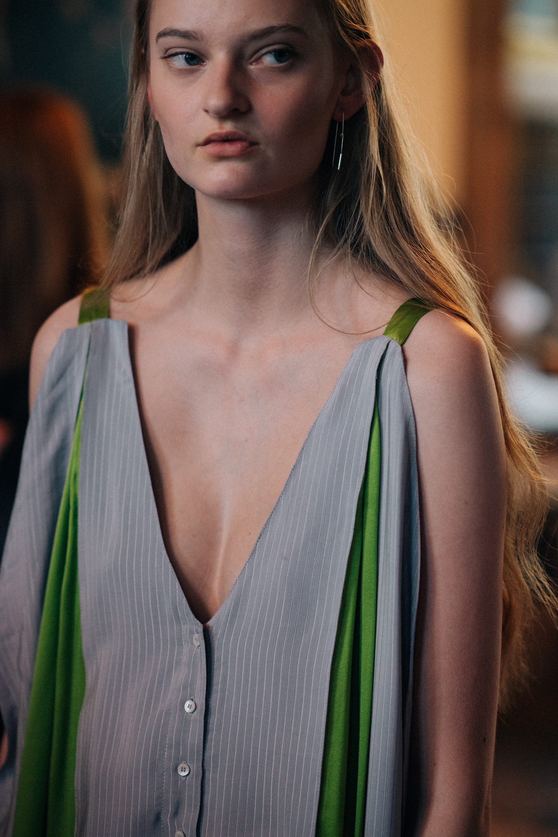 Model wearing blue shirt dress