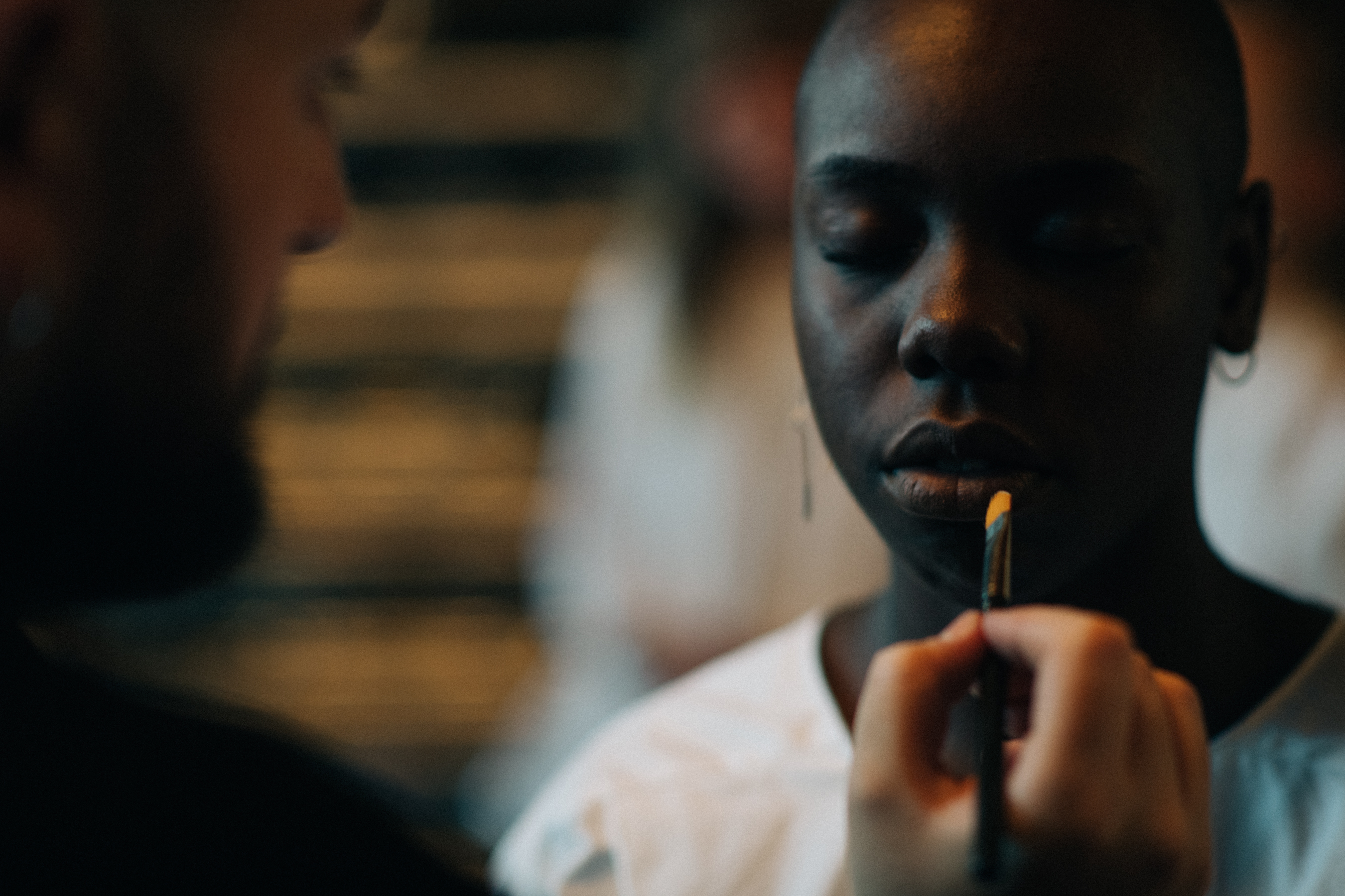 Model getting make up done