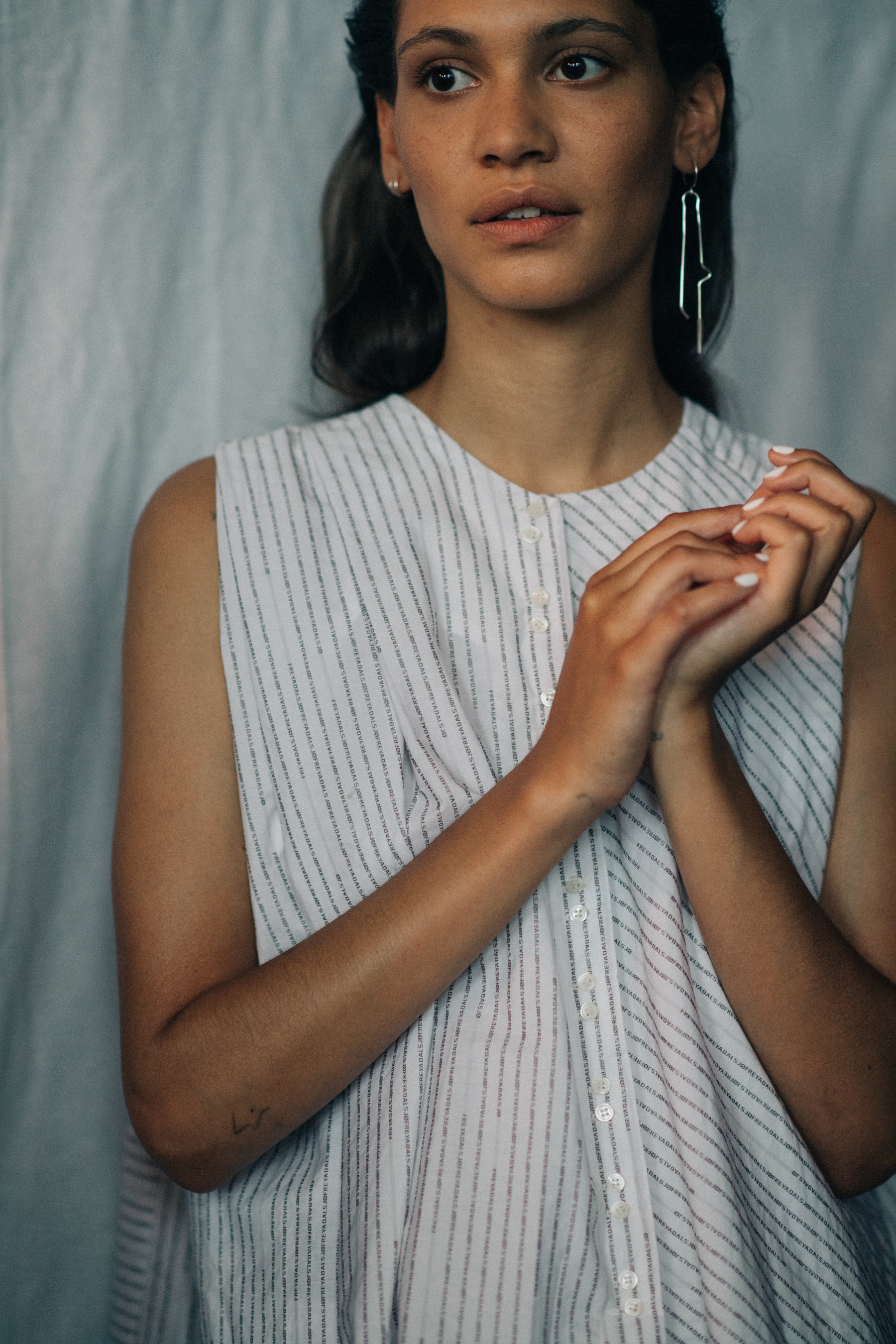 Model wearing shirt dress