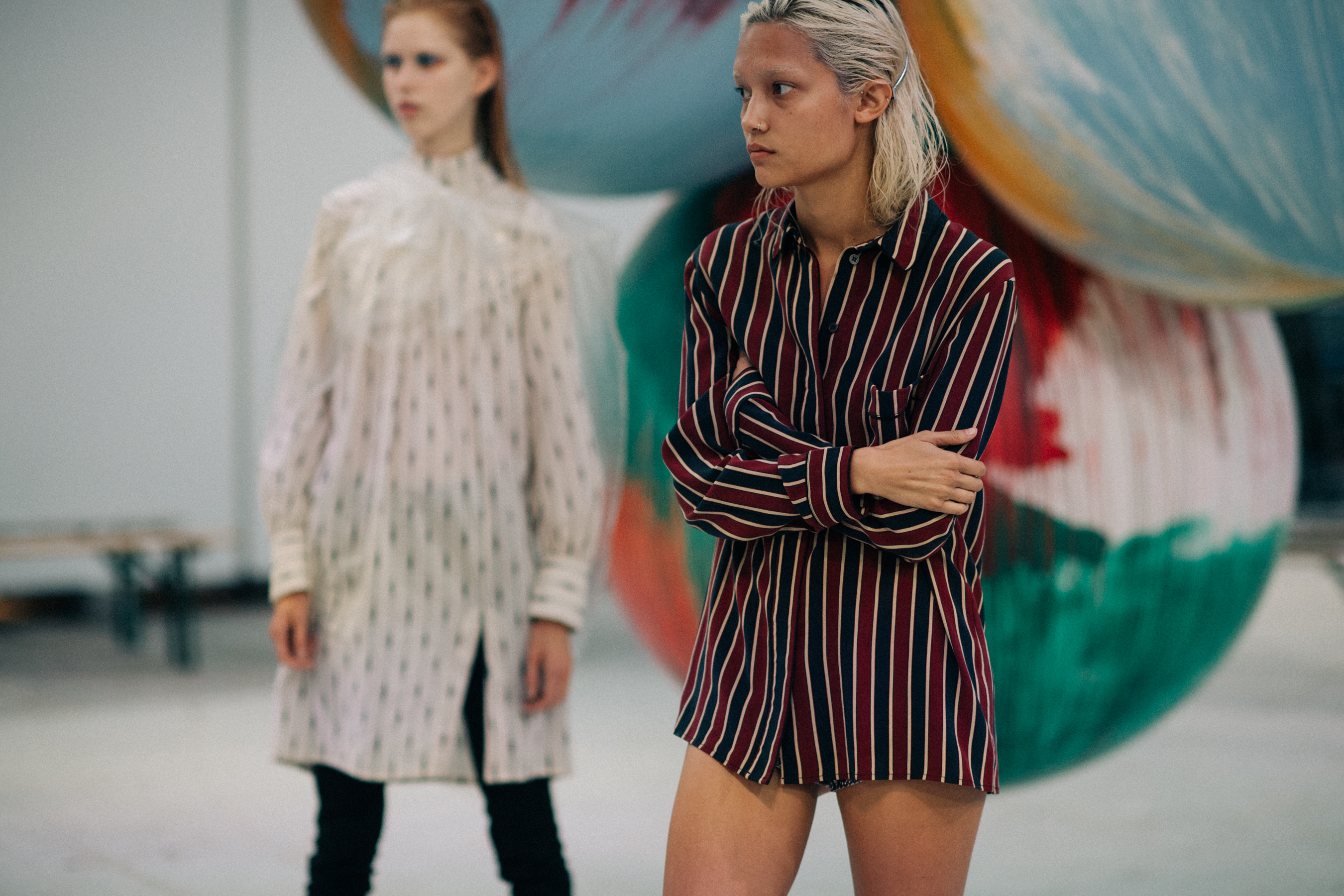 Two models rehearsing before the show