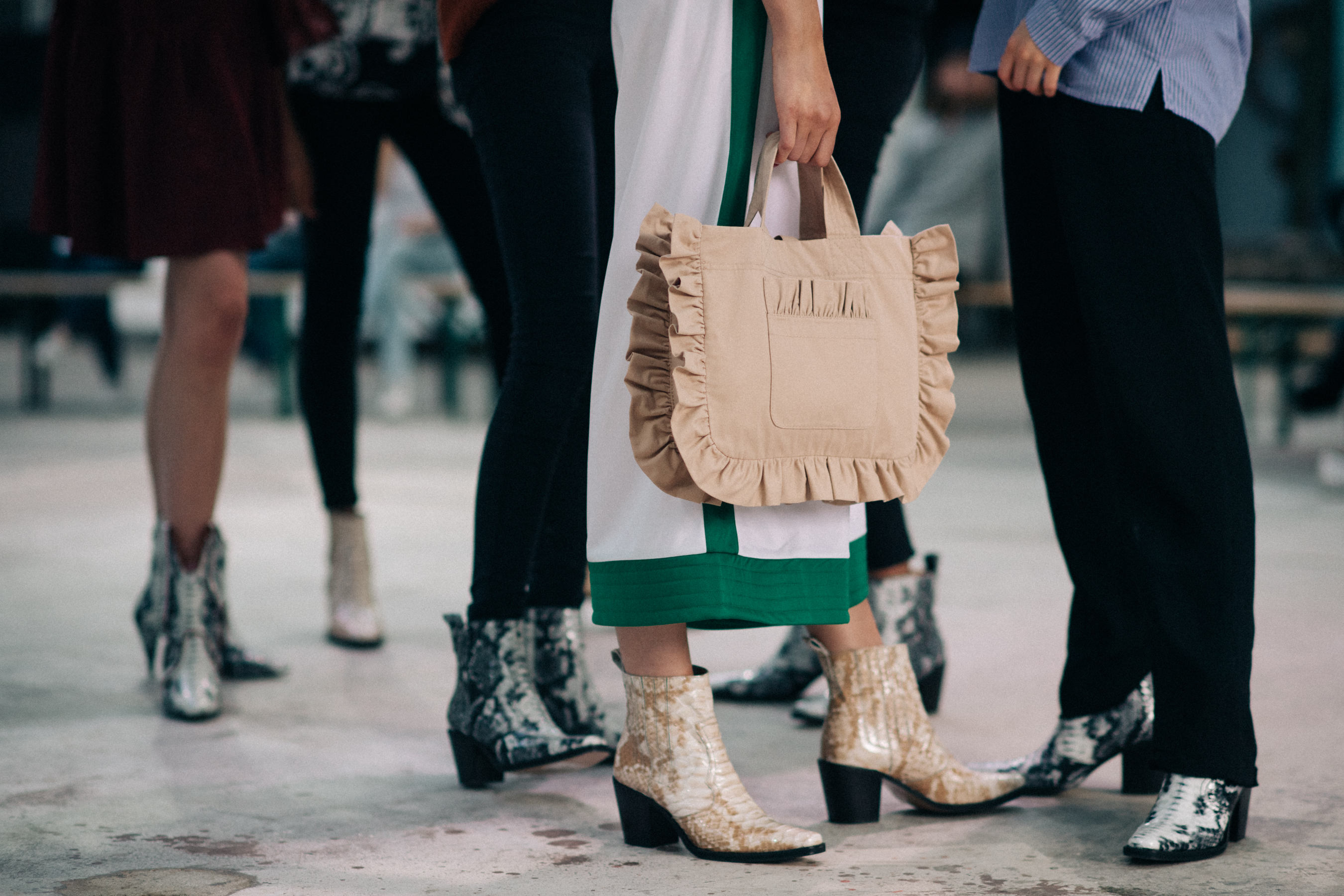 Group of models wearing leather boots