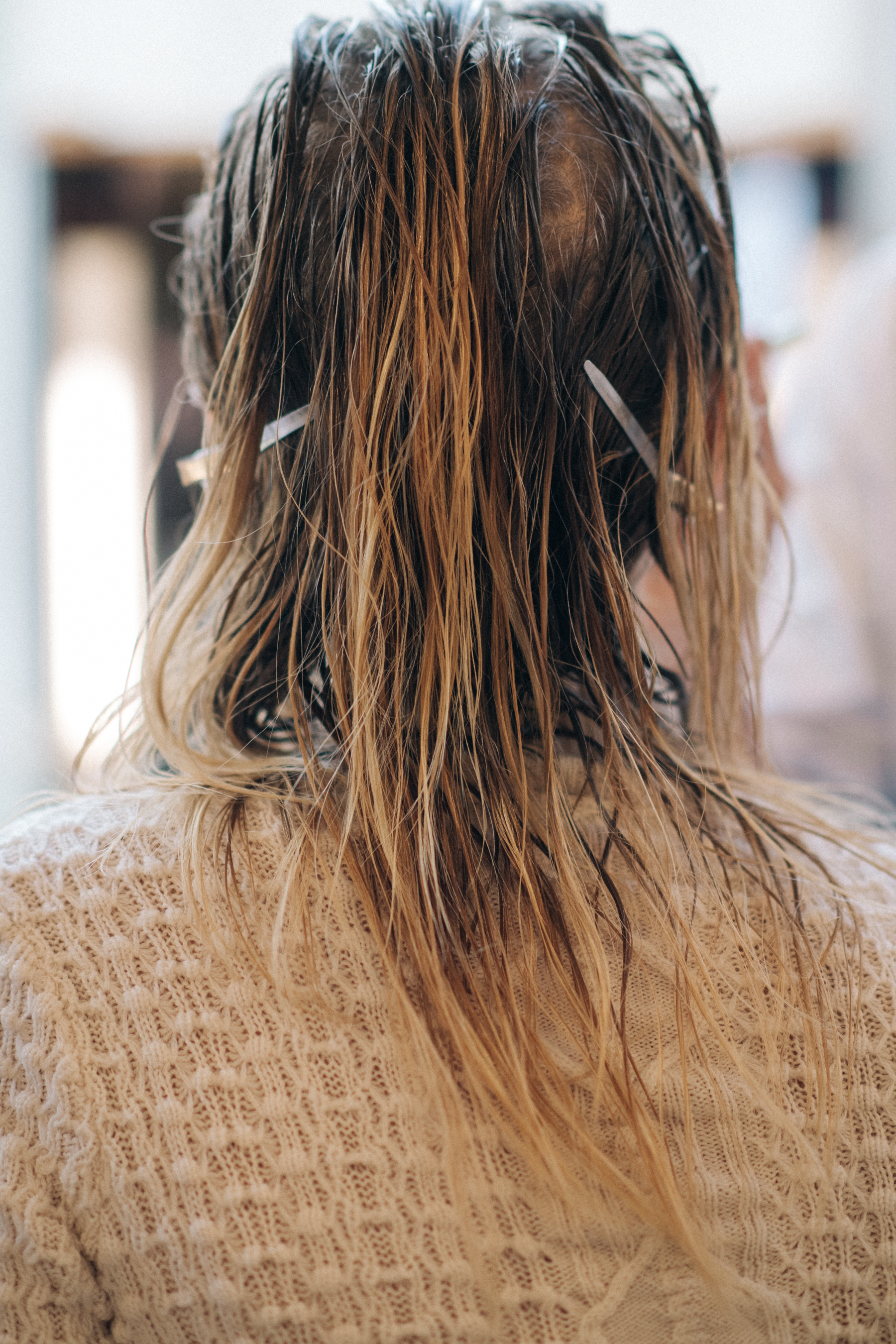 Model getting wet hair done
