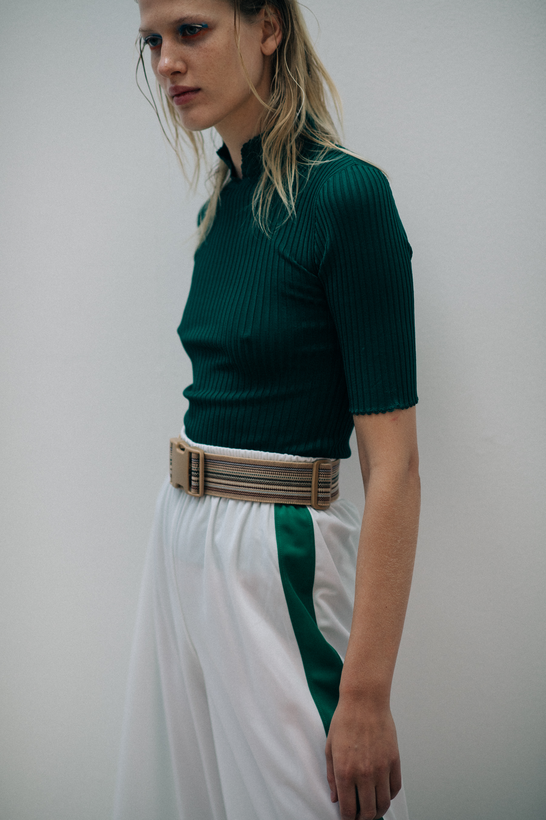 Danish model wearing green shirt