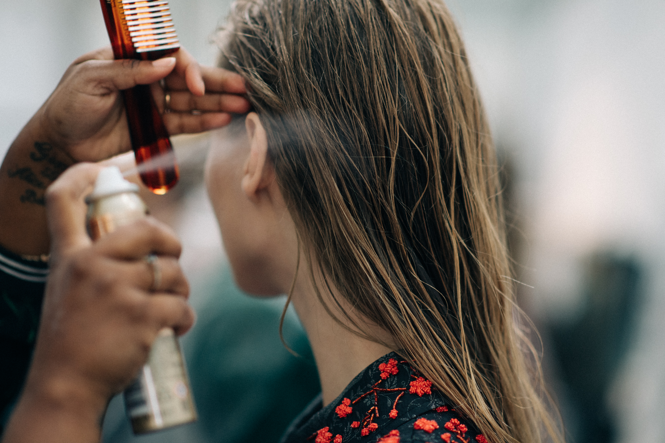 Model getting hair done