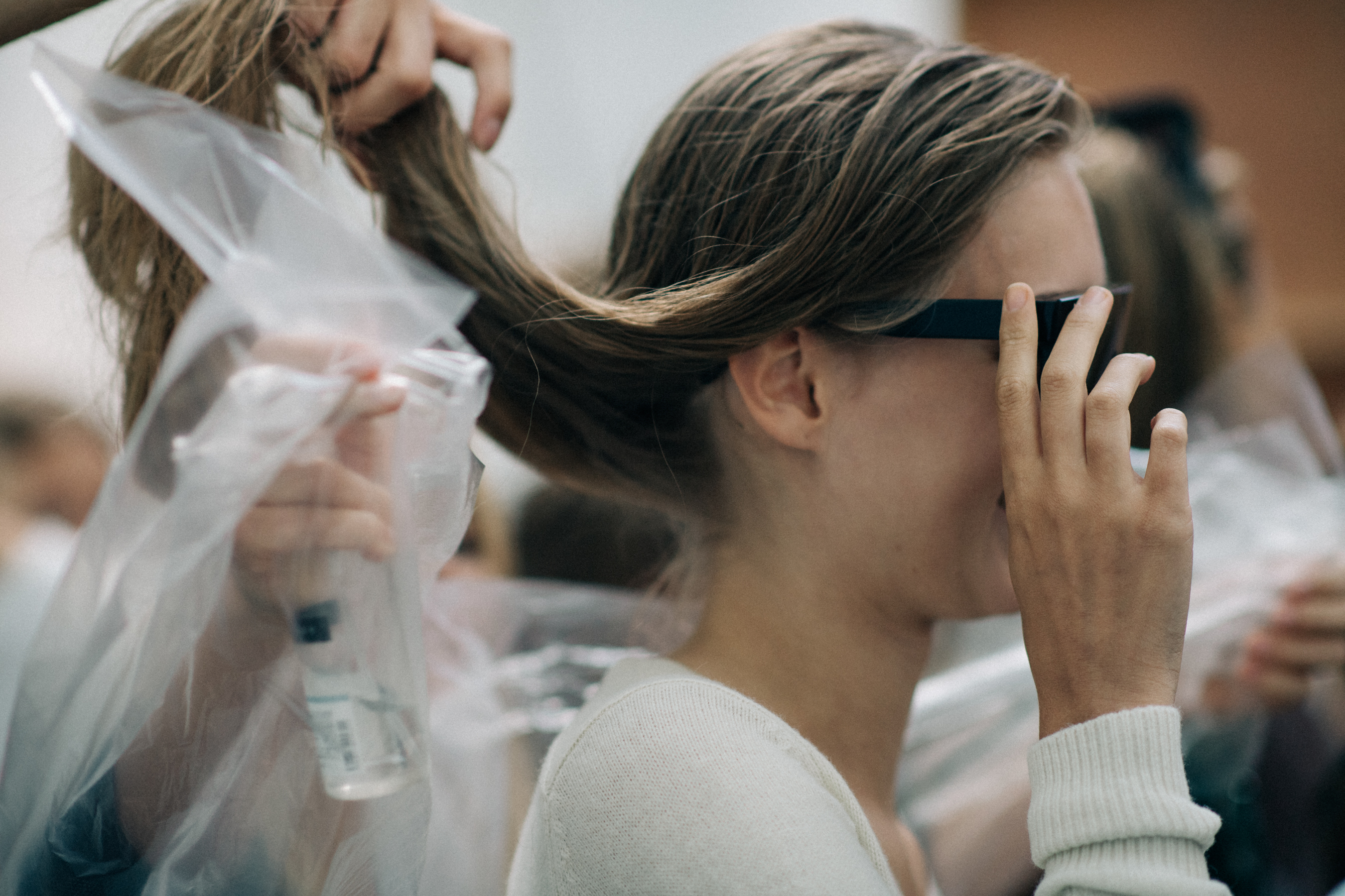 Model wearing glasses before show