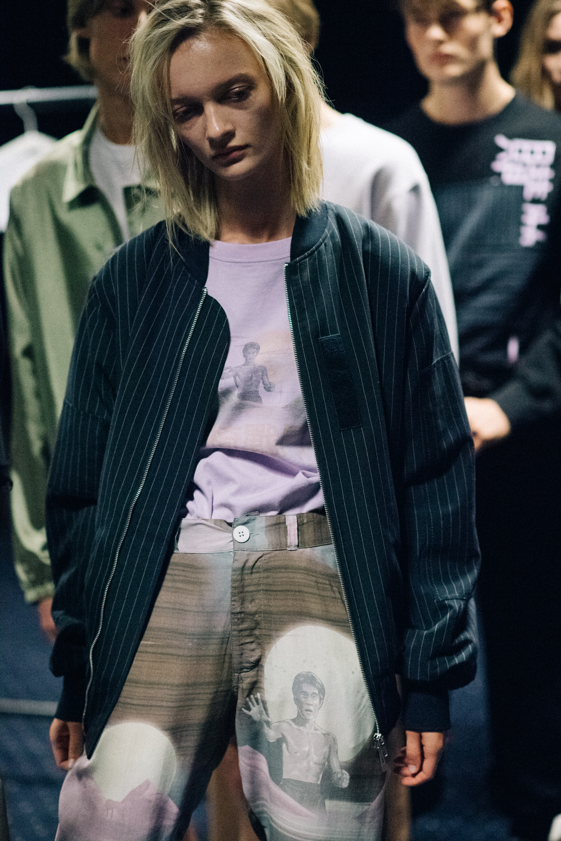 Model wearing Bruce Lee print pants