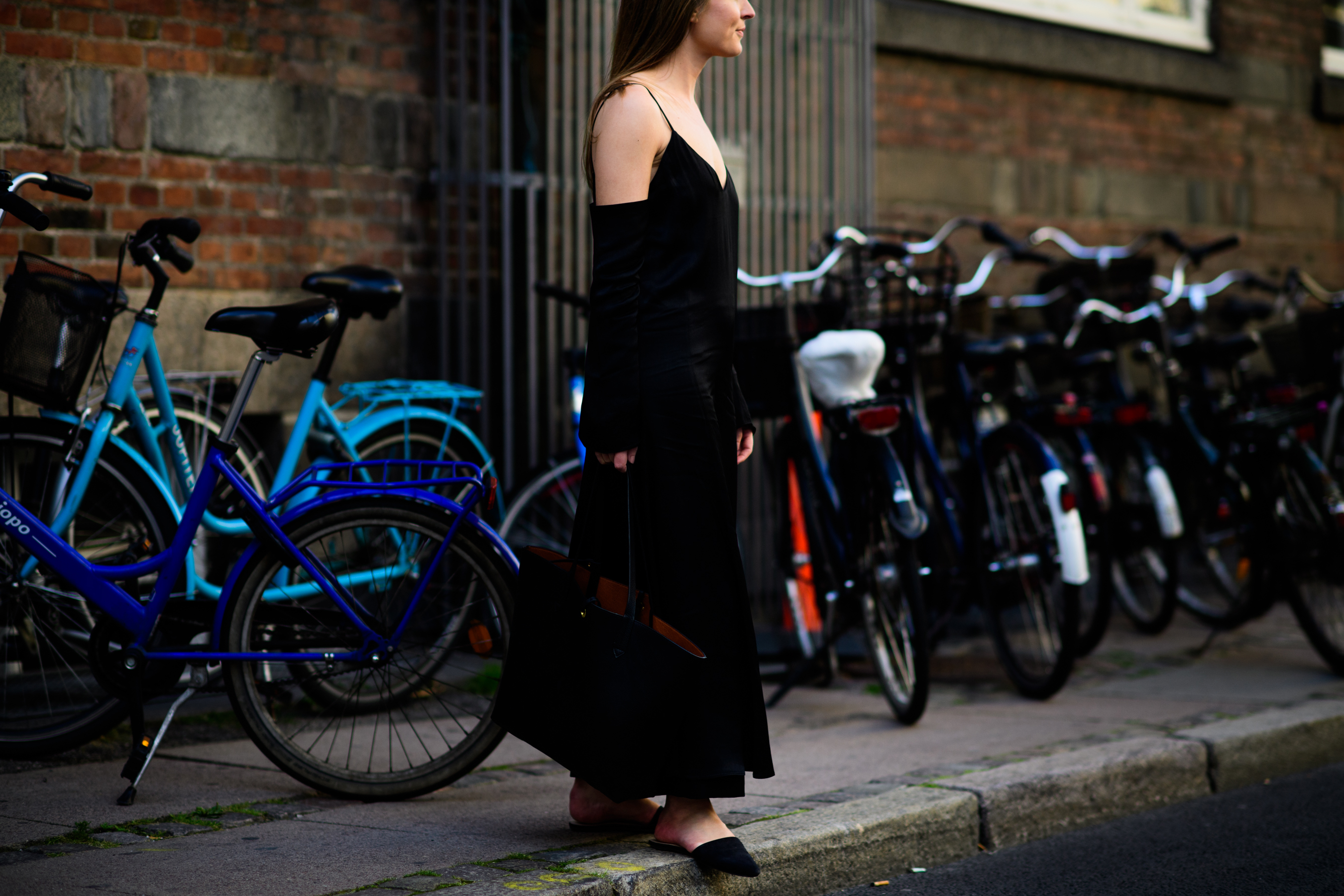 Girl wearing black dress and shoes