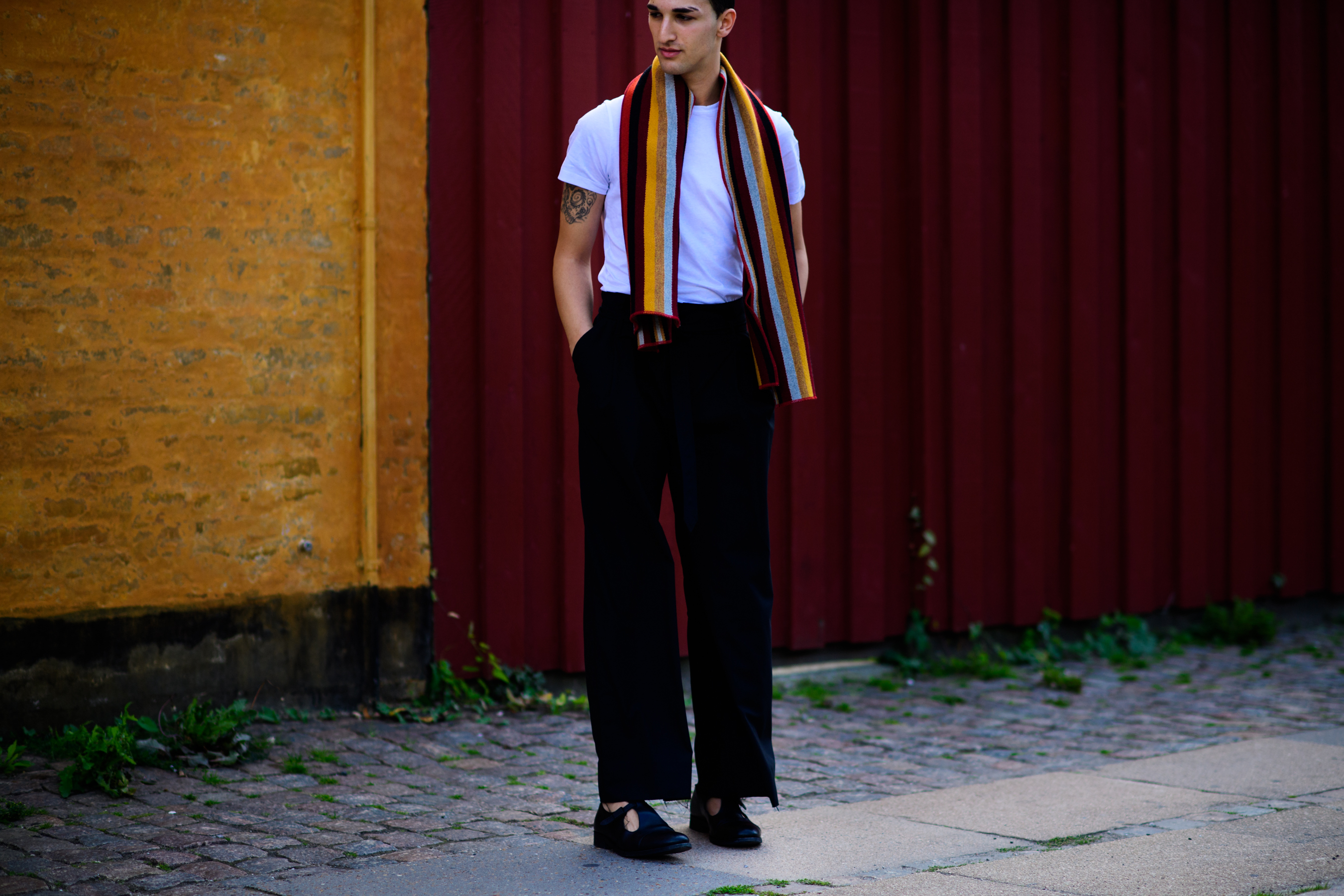 Man wearing colourful scarf