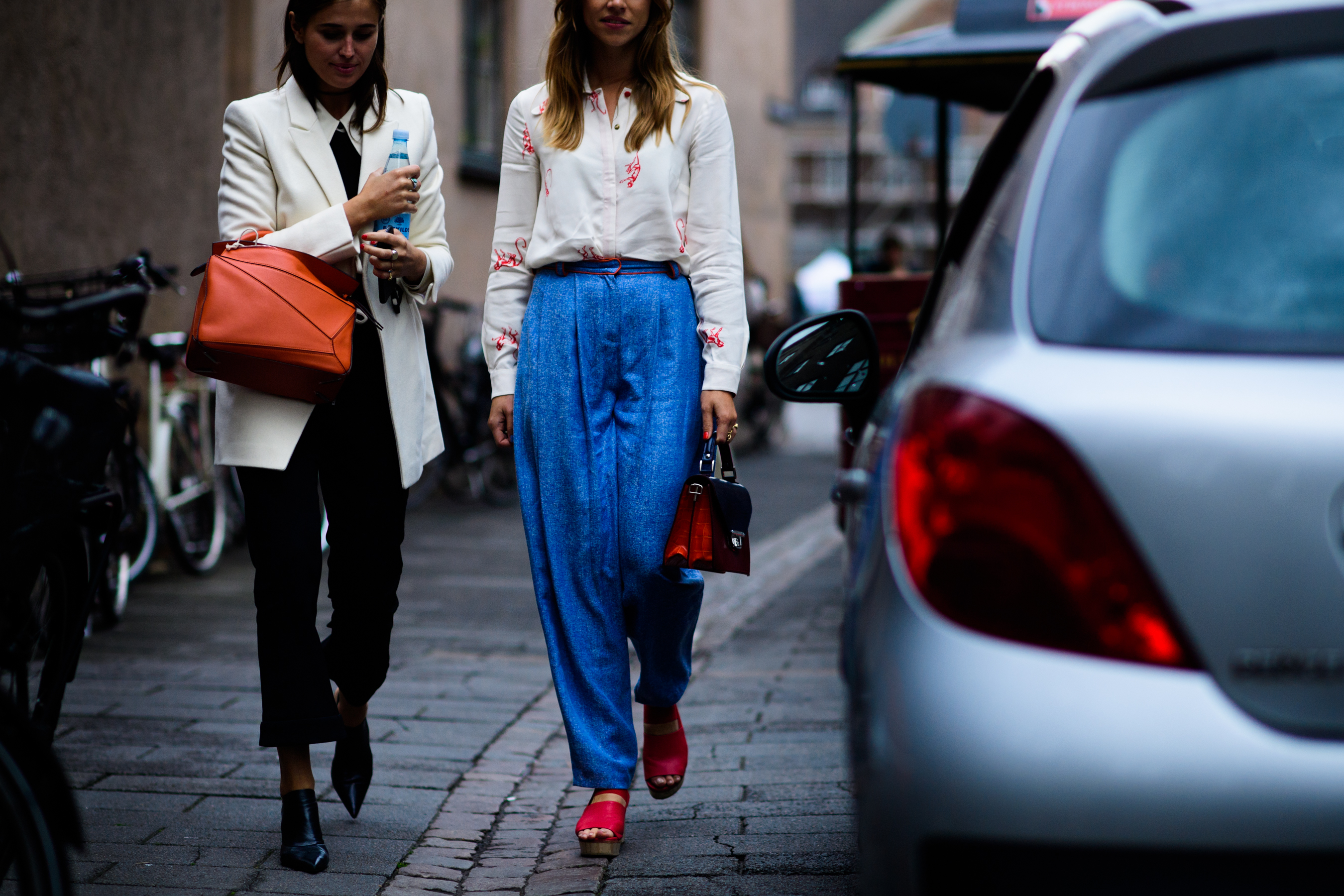 Two bloggers wearing white tops