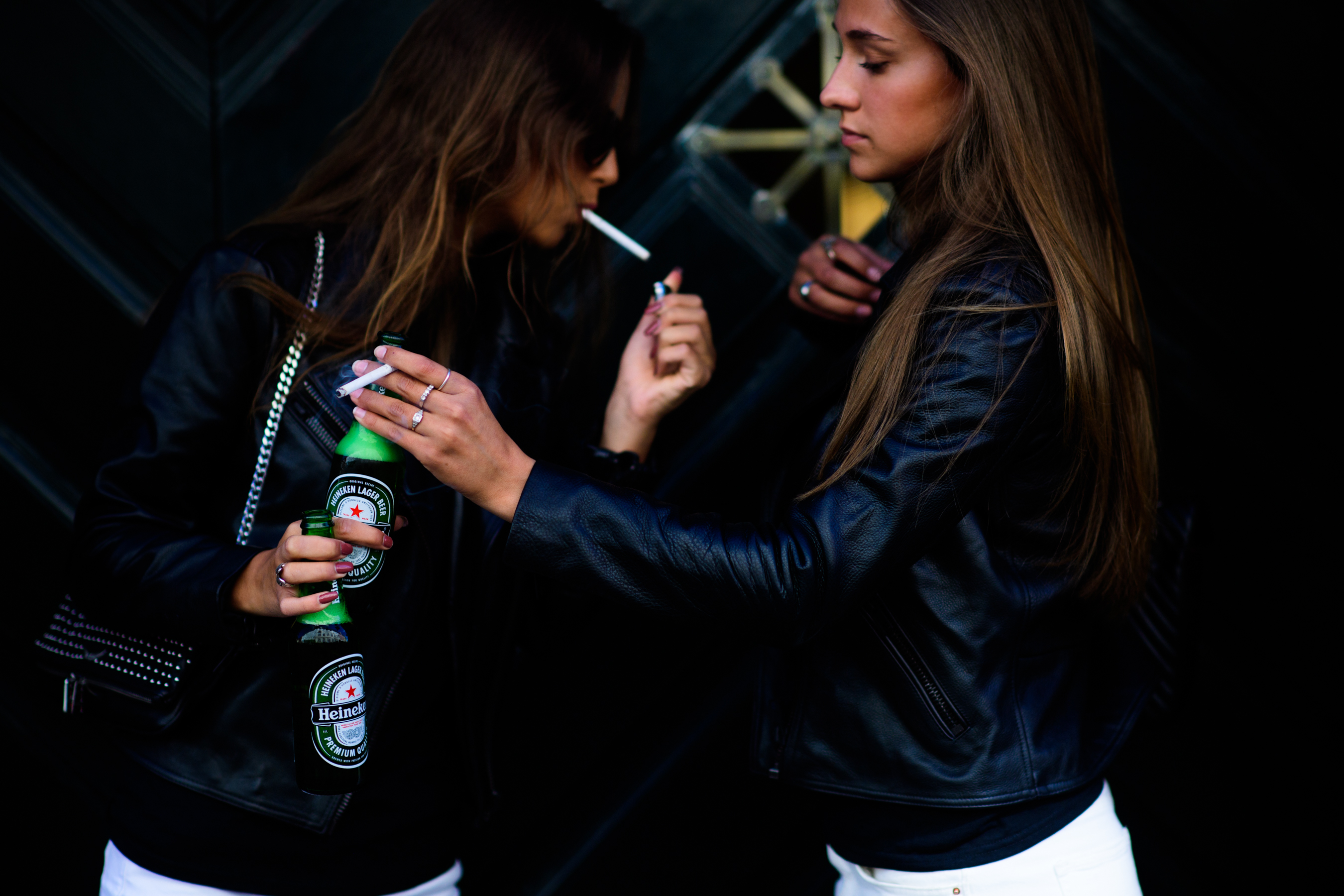 Two girls wearing The AM Crew jackets