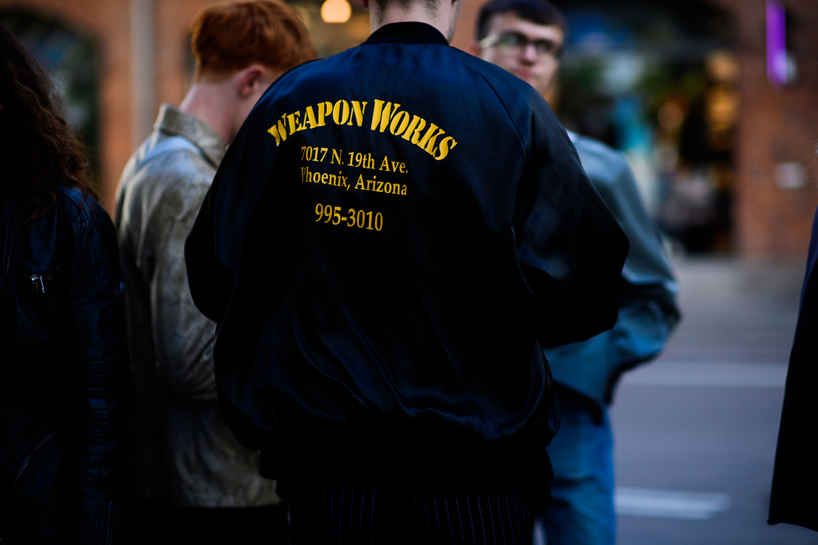 Man wearing Weapon Works bomber