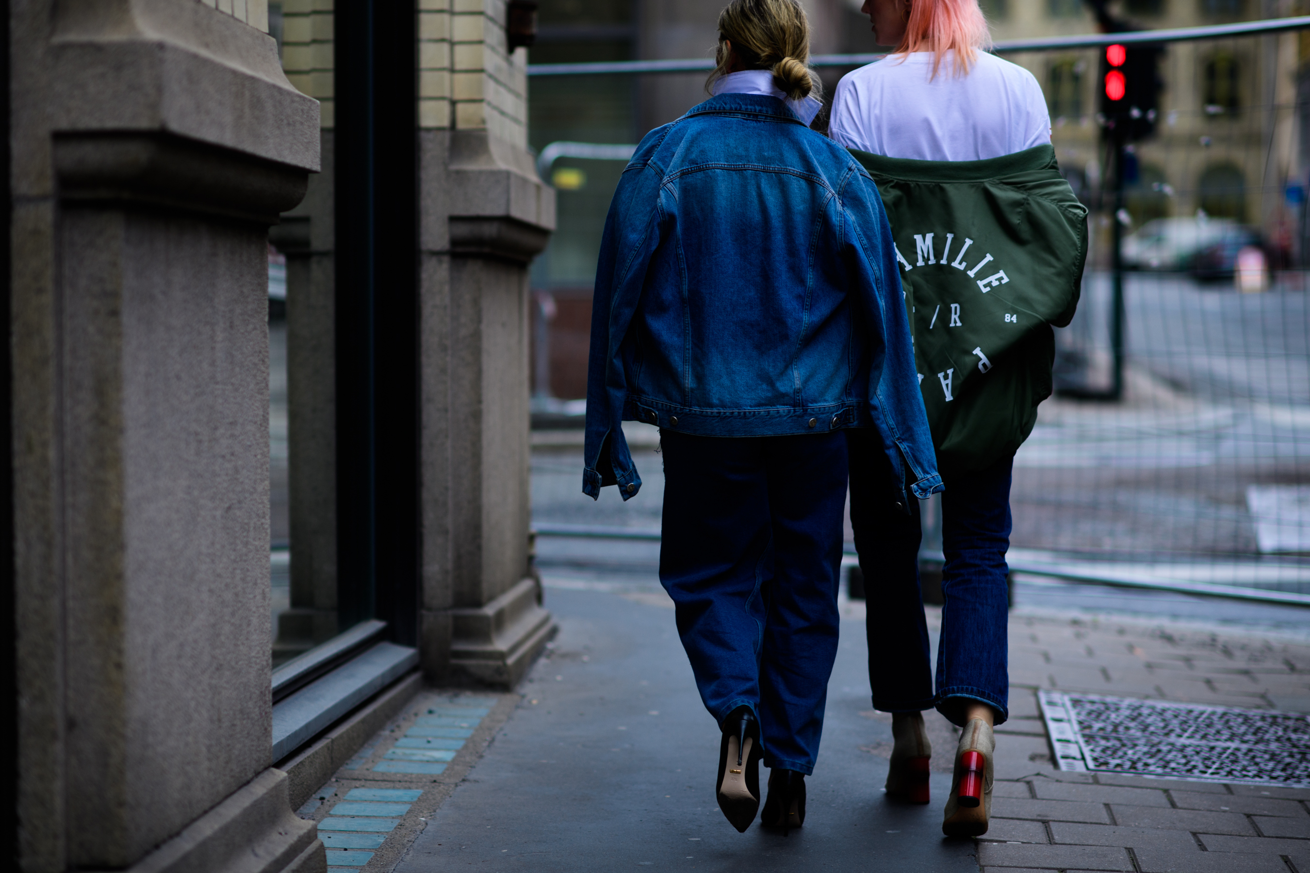 Two women wearing denim
