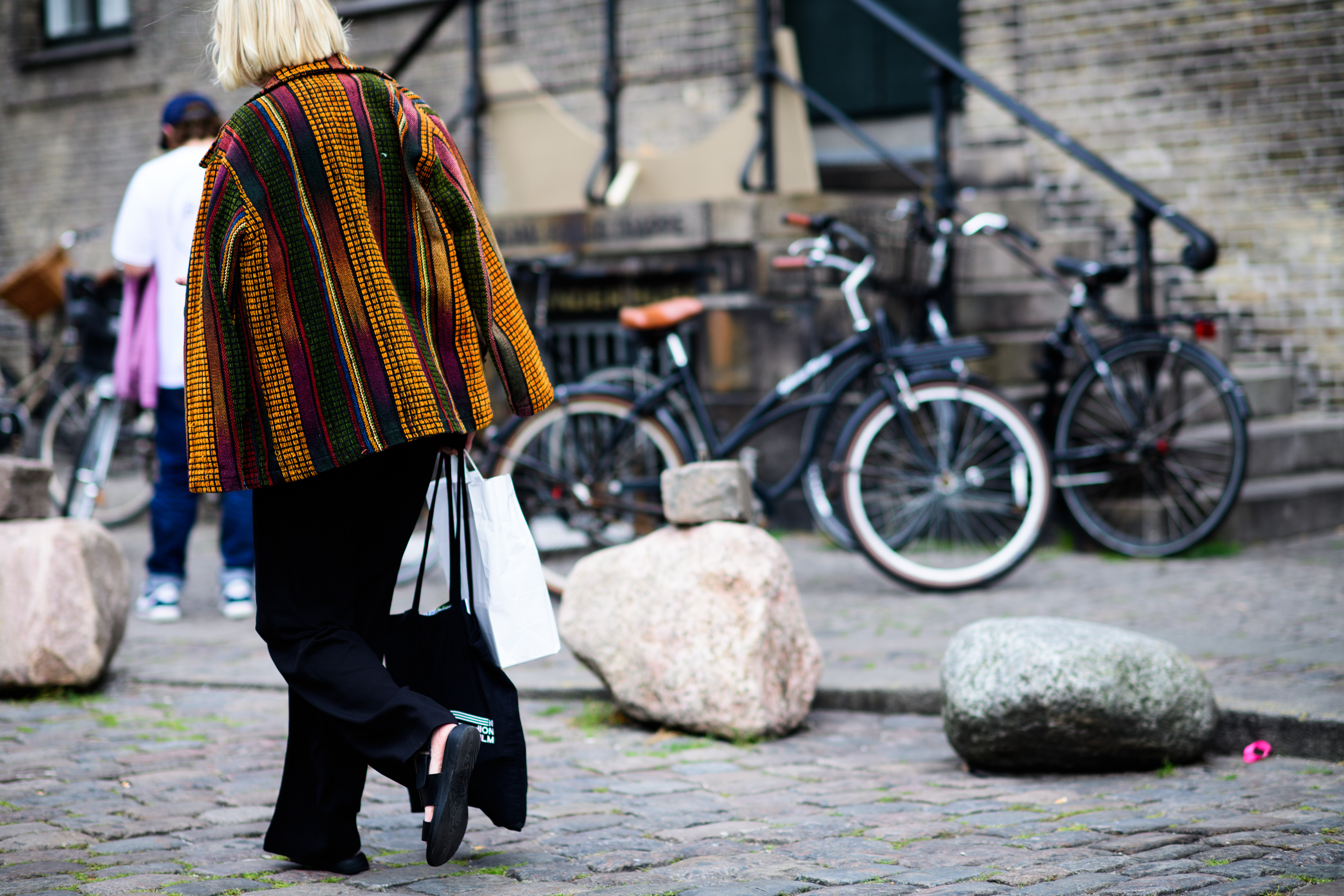 Woman wearing multi colour jacket