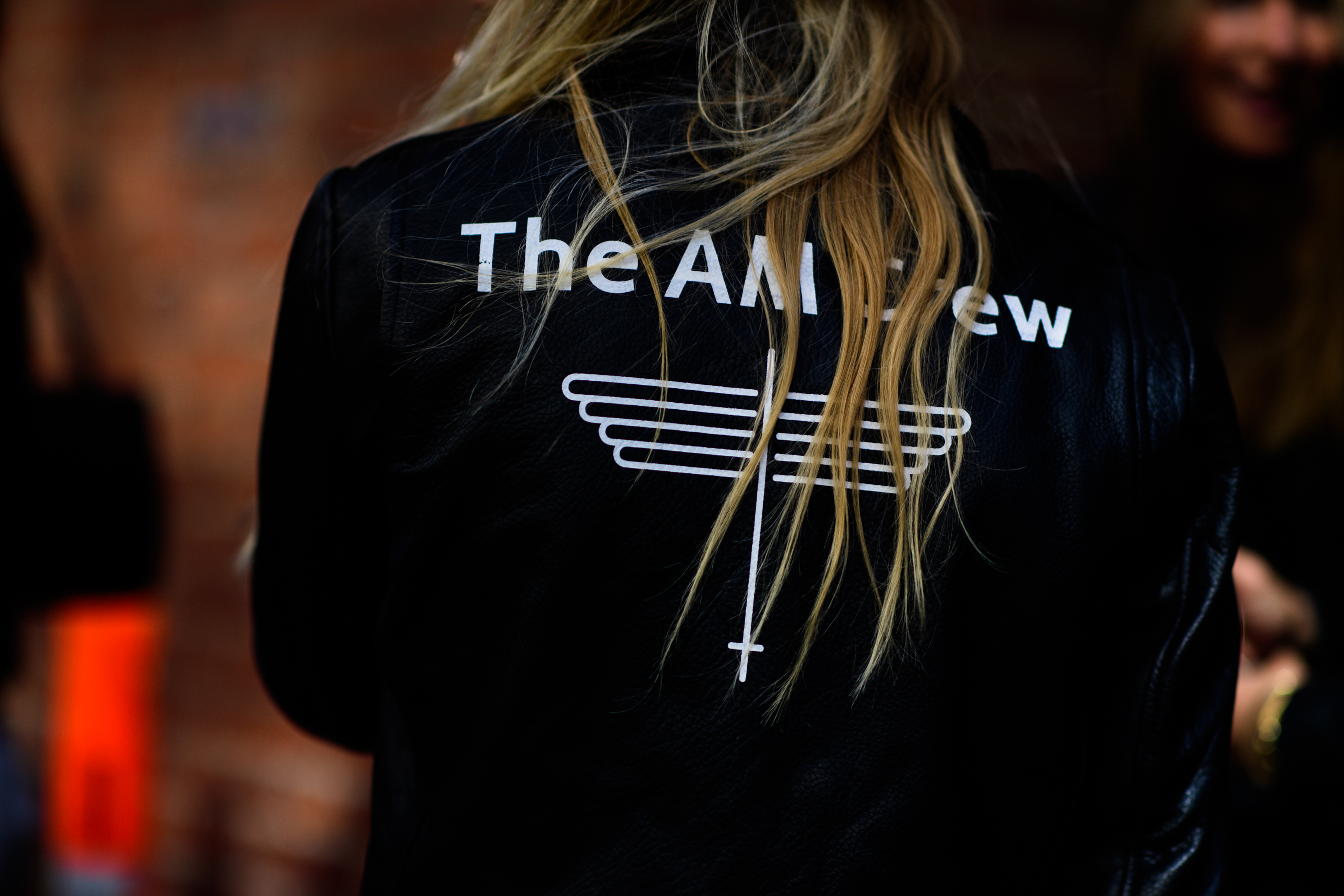 Woman wearing The AM Crew jacket