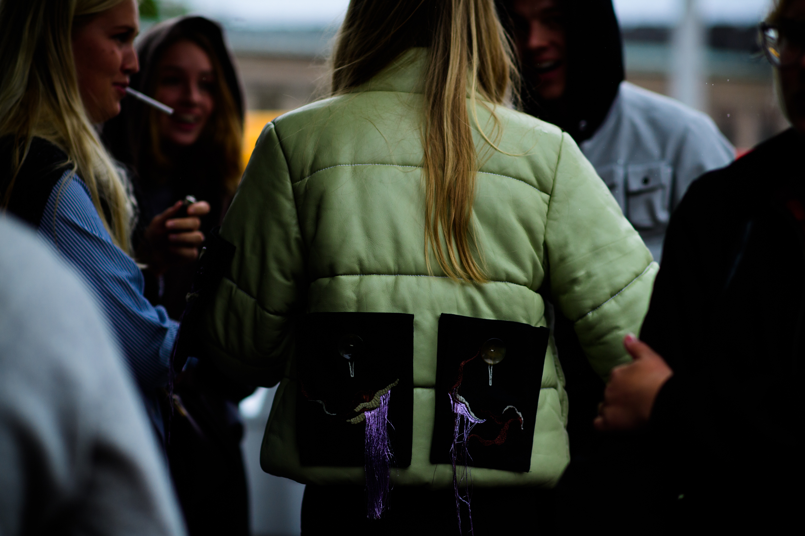 Danish model wearing green jacket