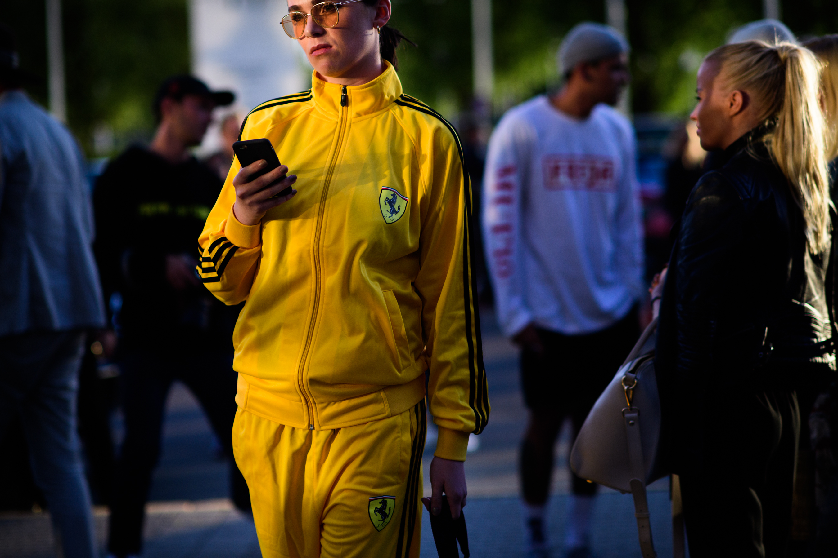 Woman wearing Ferrari track suit