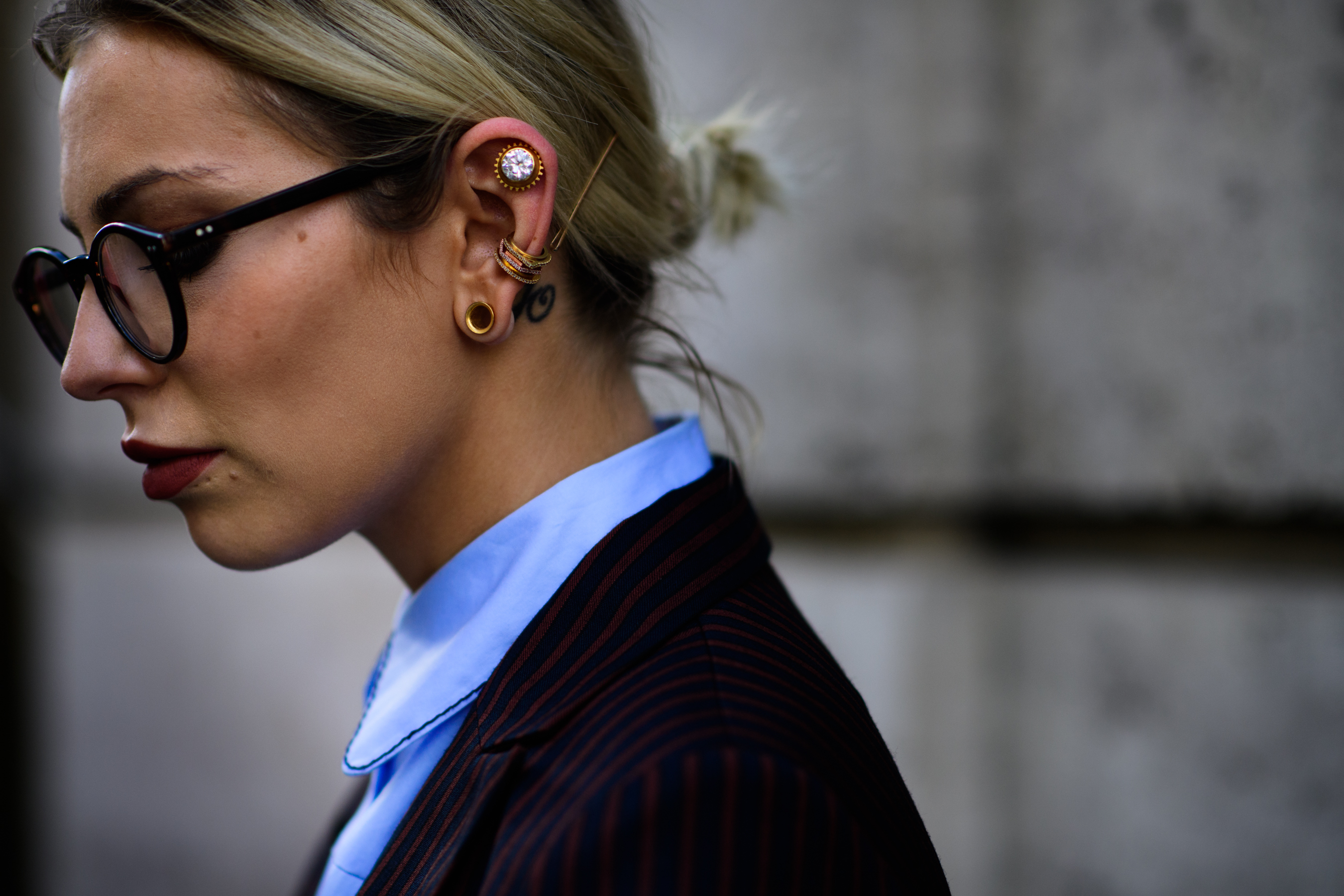 Girl with multiple ear piercings