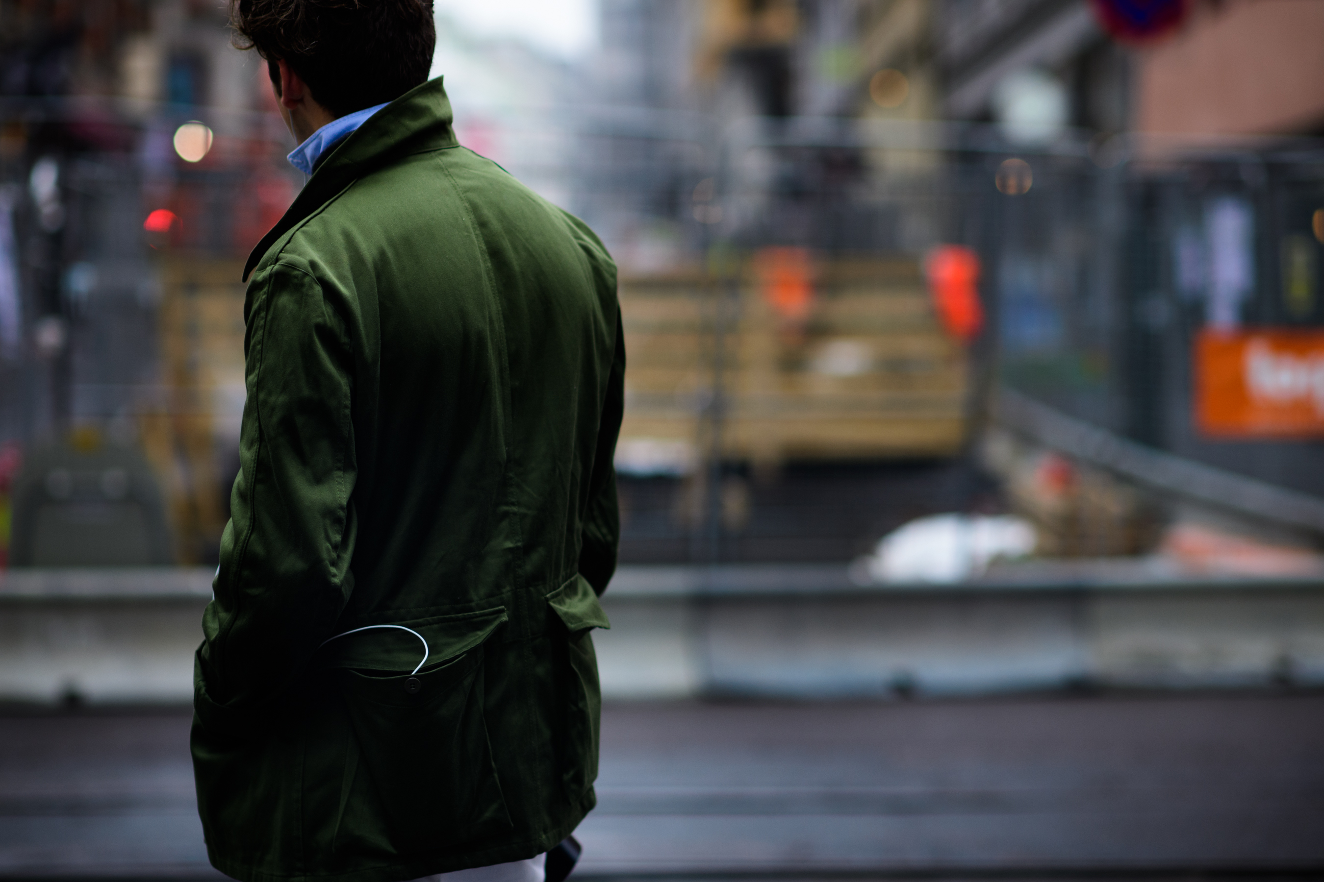 American photographer wearing green