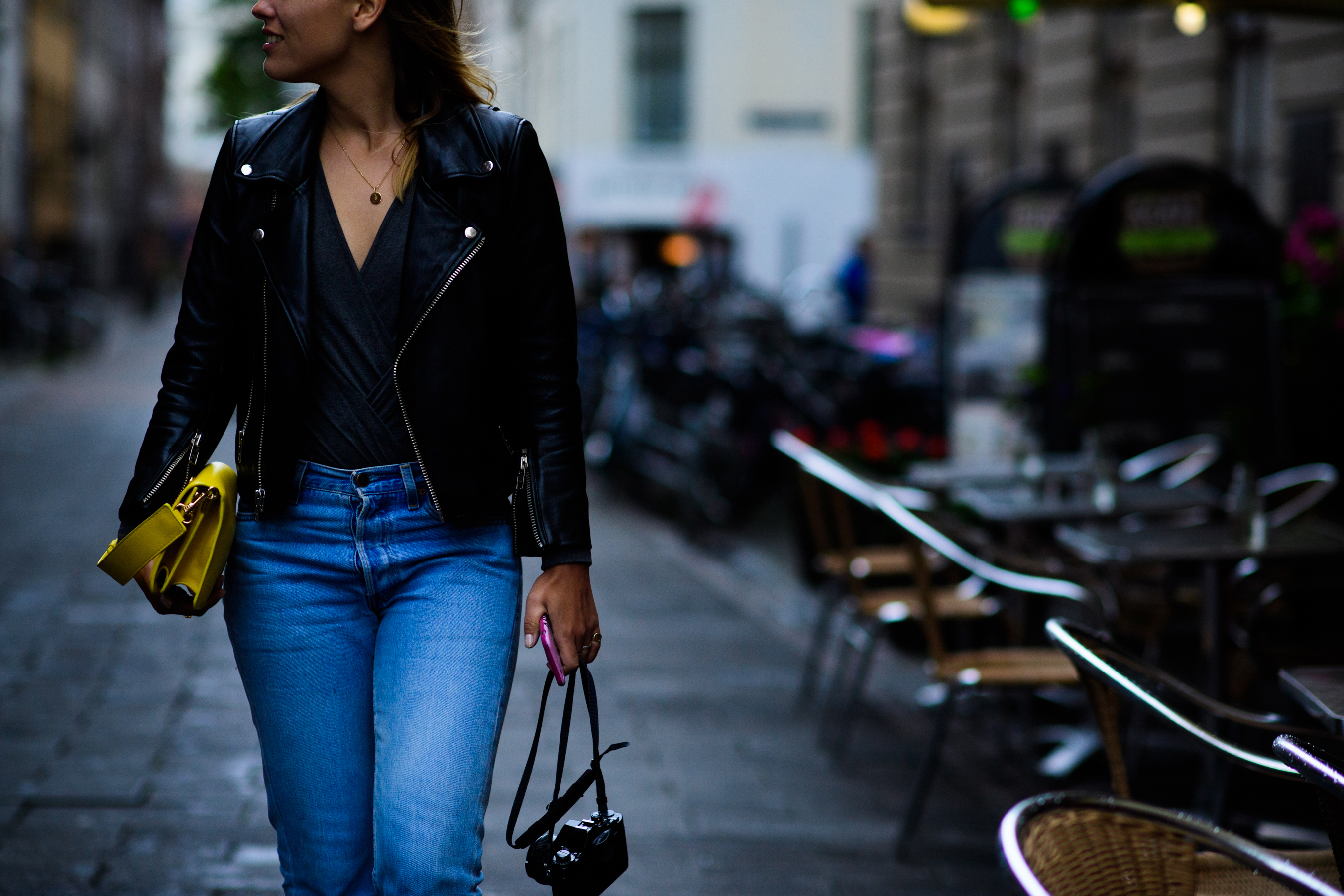 Woman wearing leather jacket and jeans