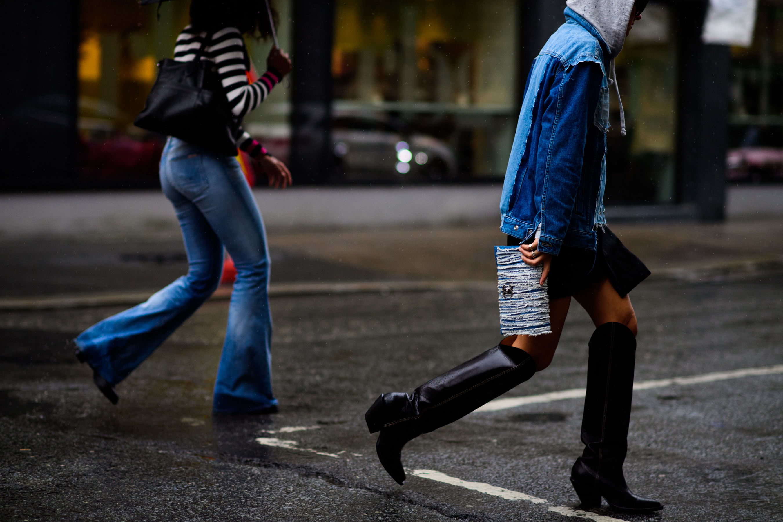 Two women crossing the road