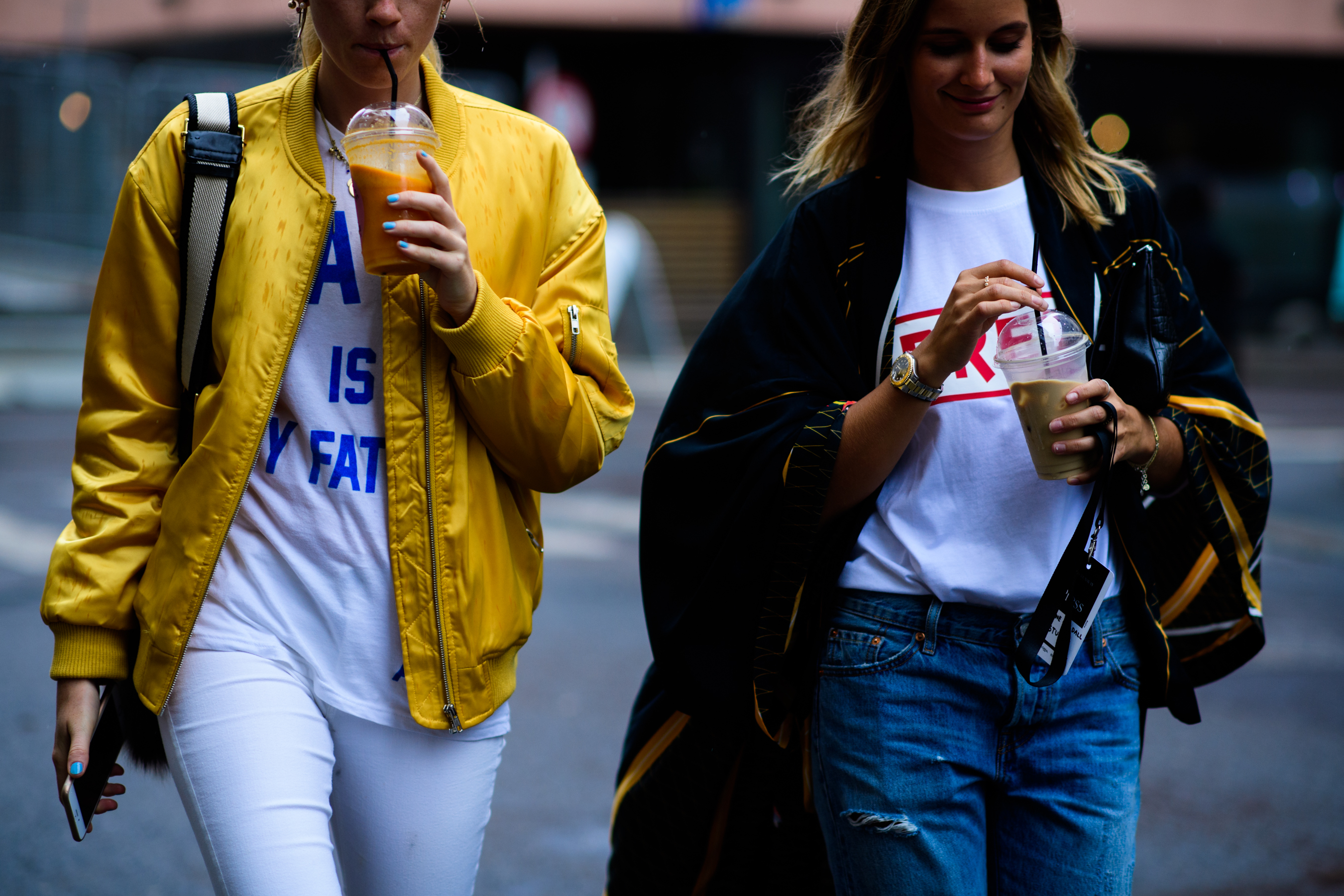 Two women wearing yellow
