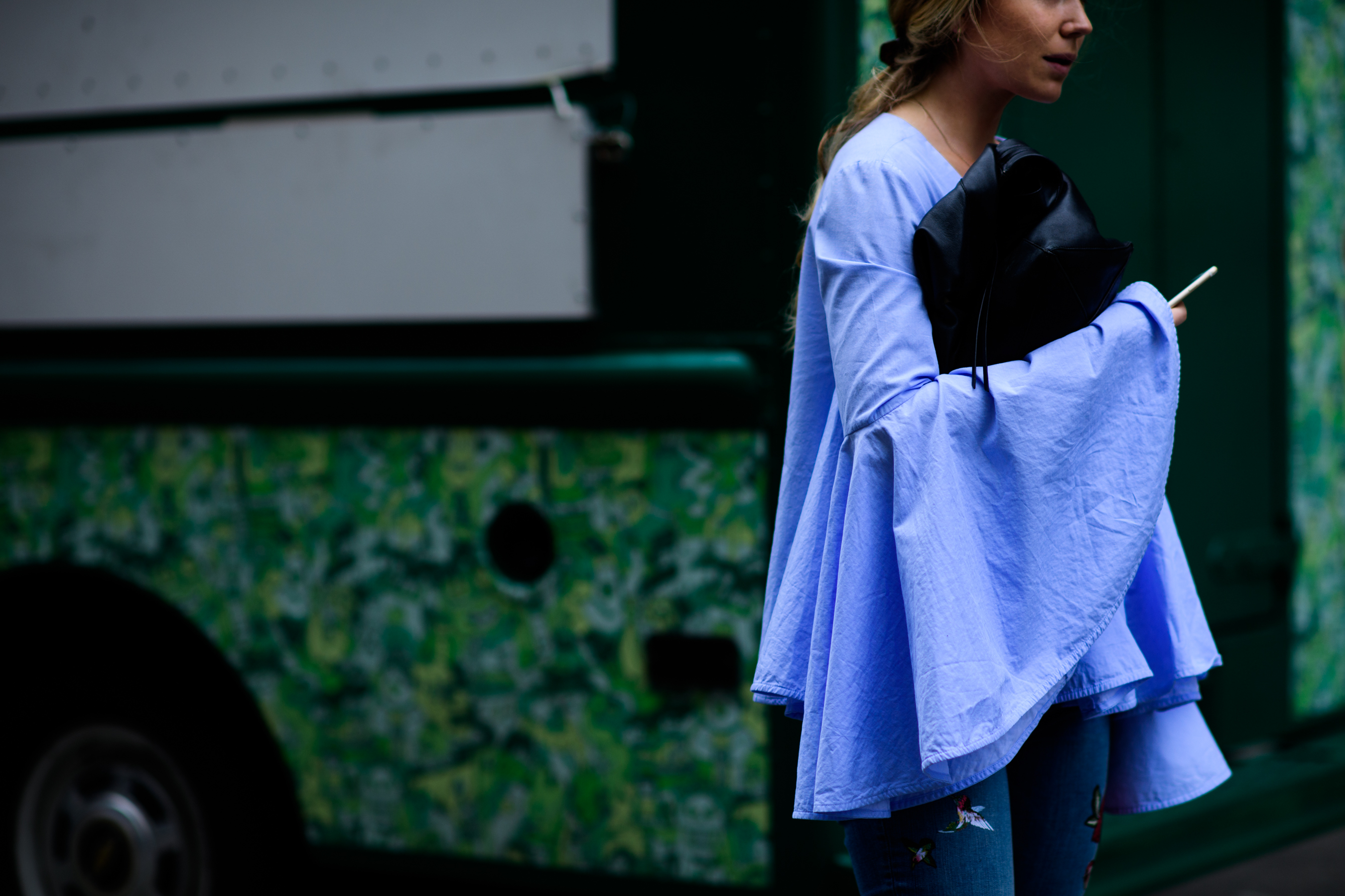 Woman wearing oversized sleeves shirt