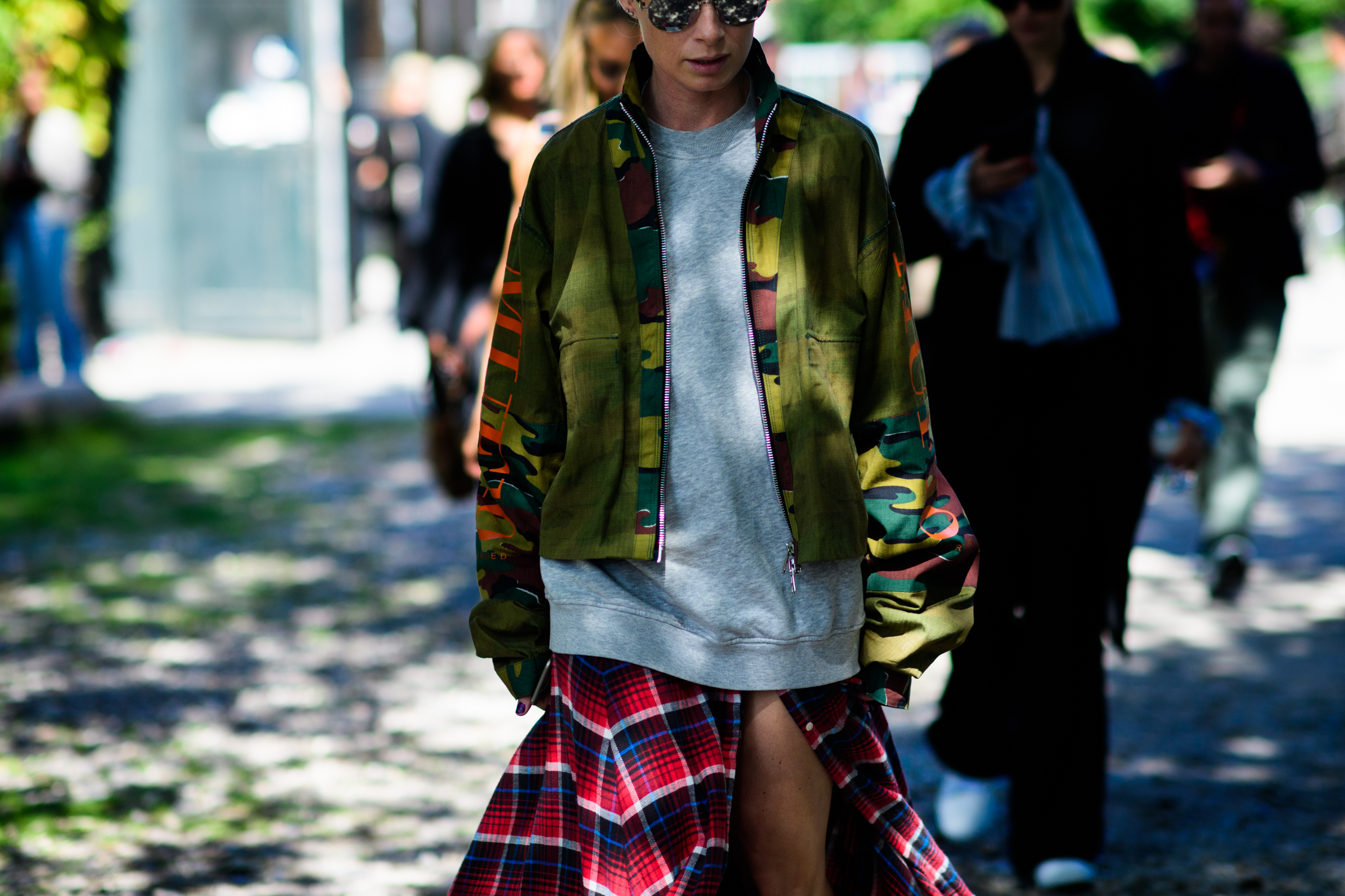 Woman wearing camo MUF10 jacket