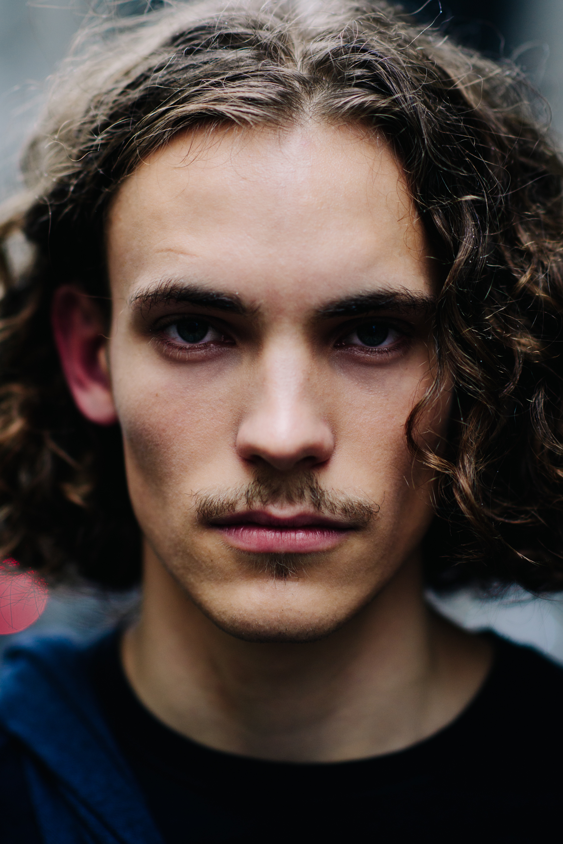 Portrait of a male model long hair