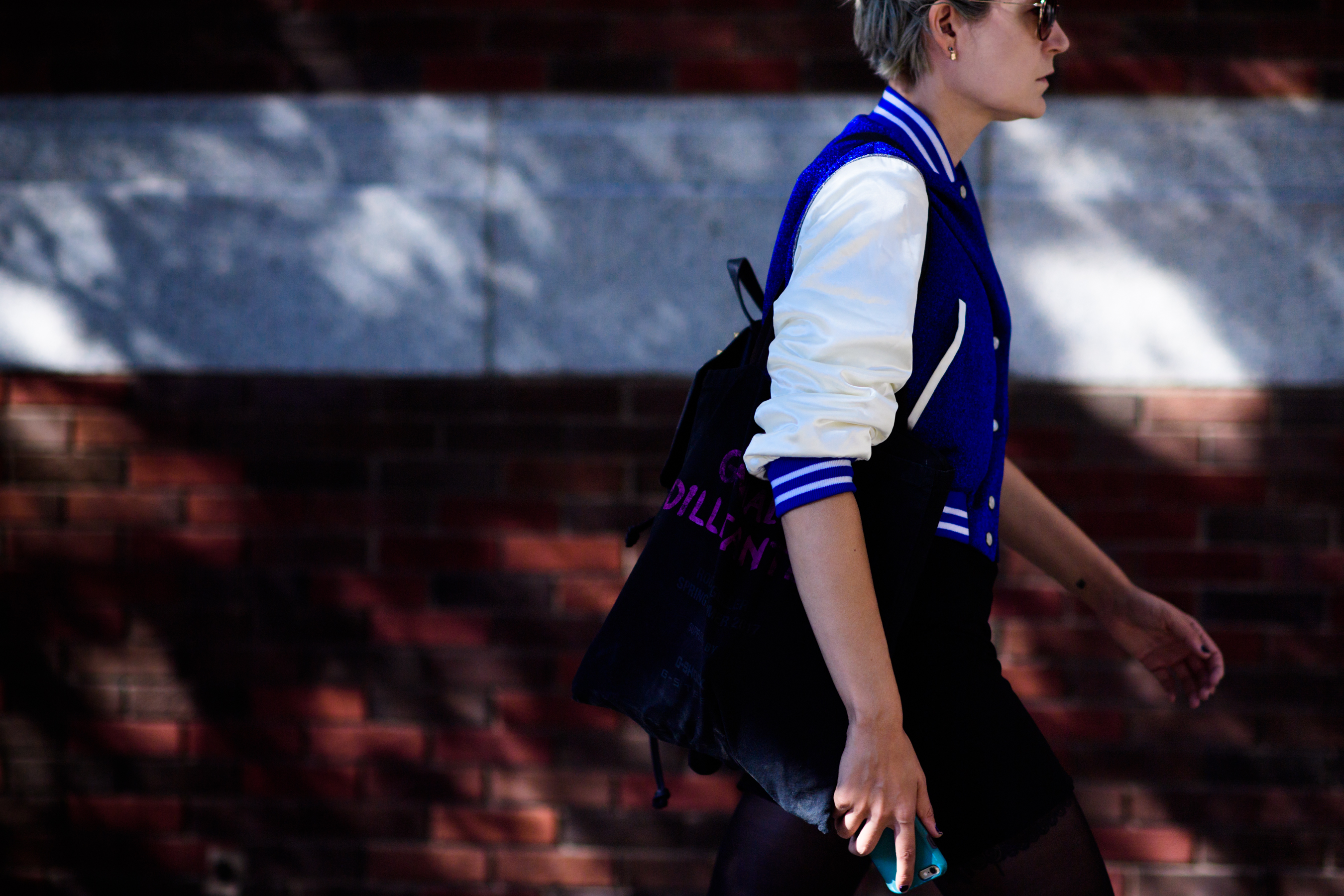 Woman wearing bomber after the show