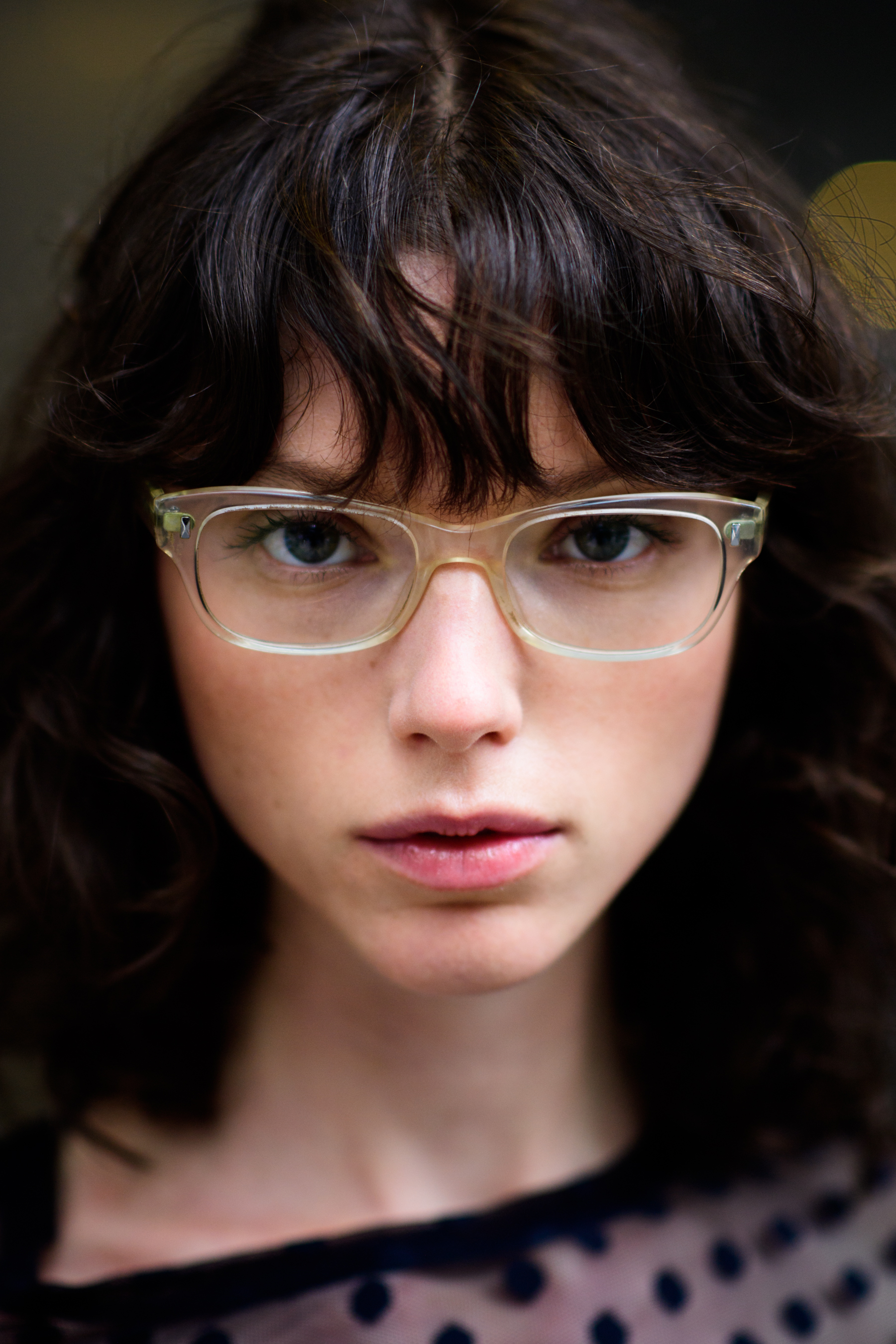 Portrait of a model with transparent glasses
