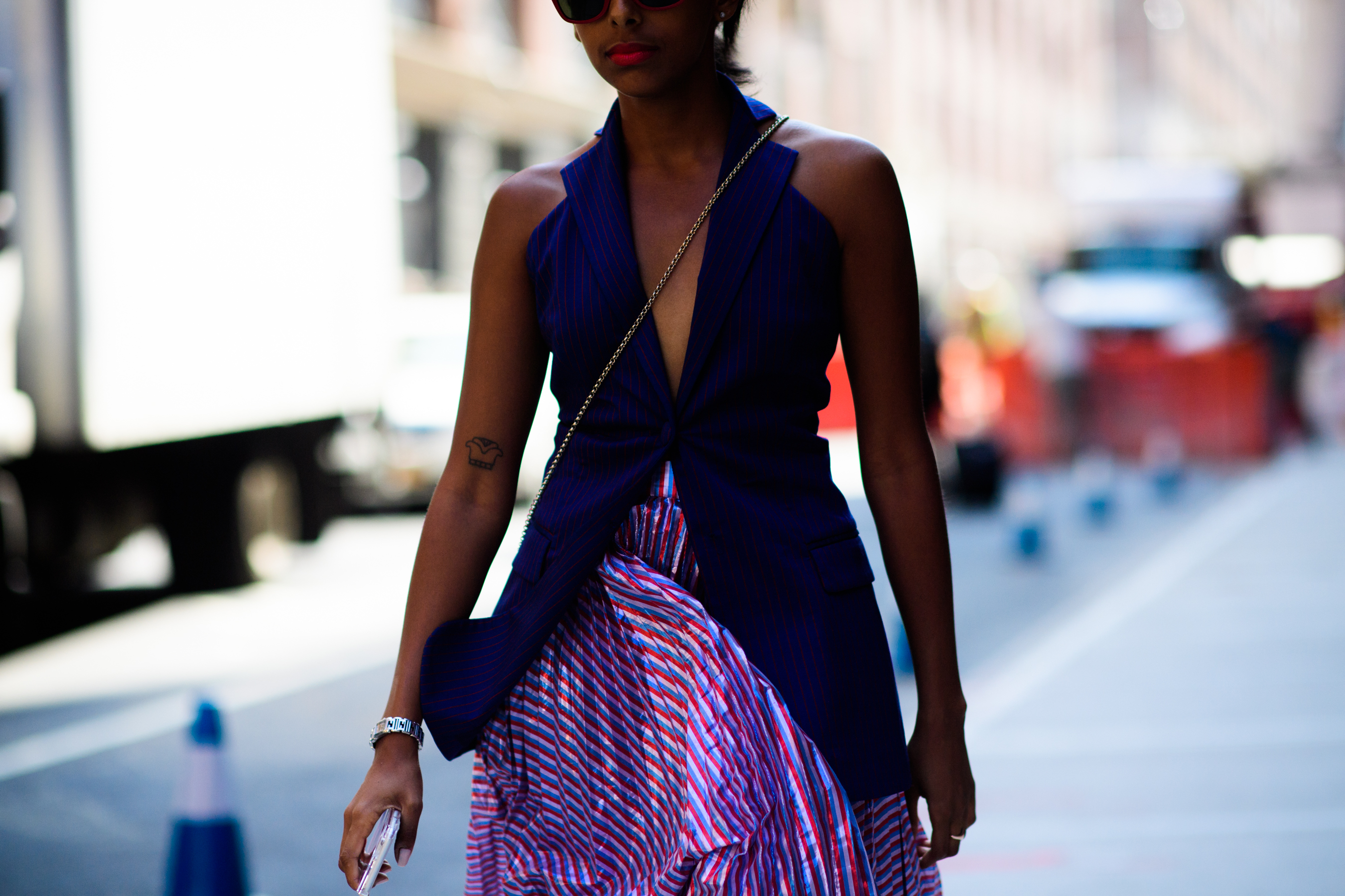 Woman wearing blue vest