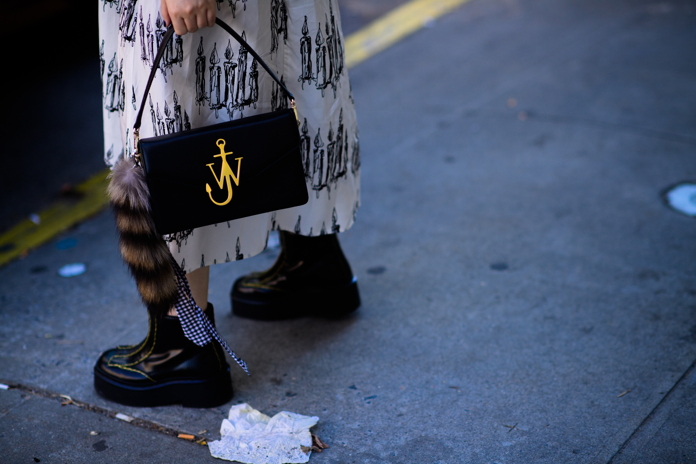 Woman holding J.W.Anderson bag