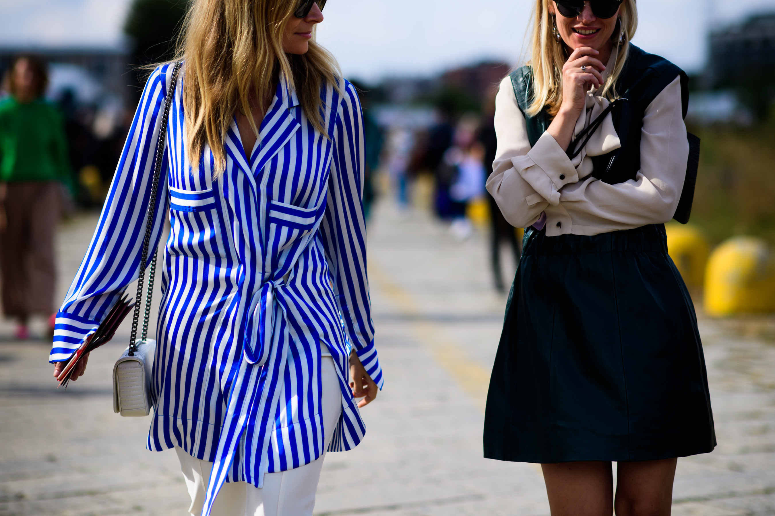 Two women wearing shirts