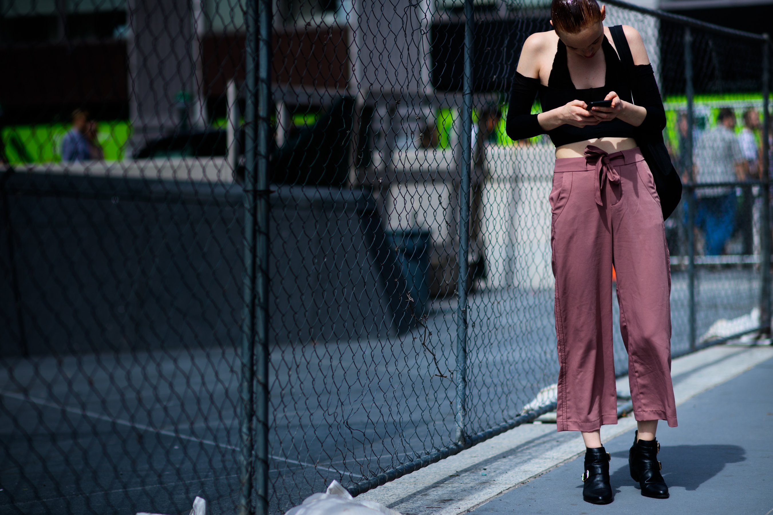Model wearing pink pants after the show