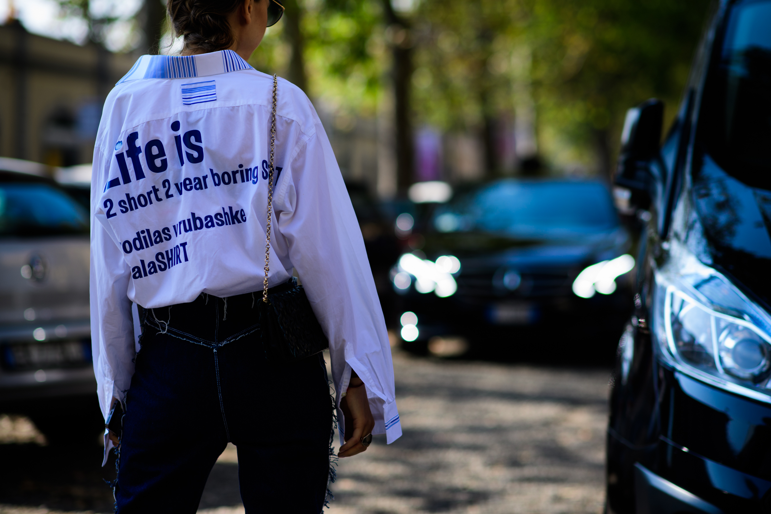 Girl wearing shirt with writing