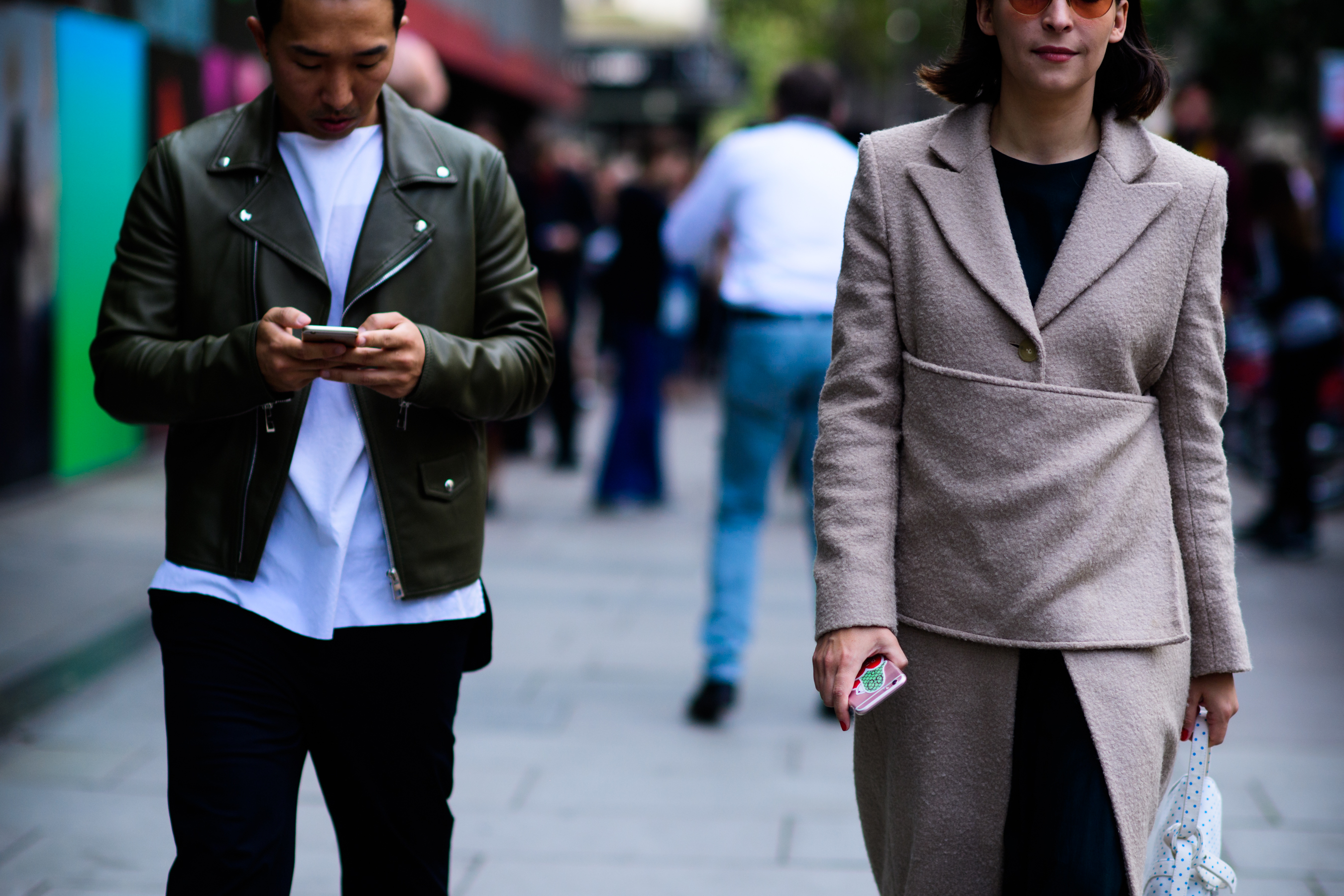 Man wearing dark green leather jacket