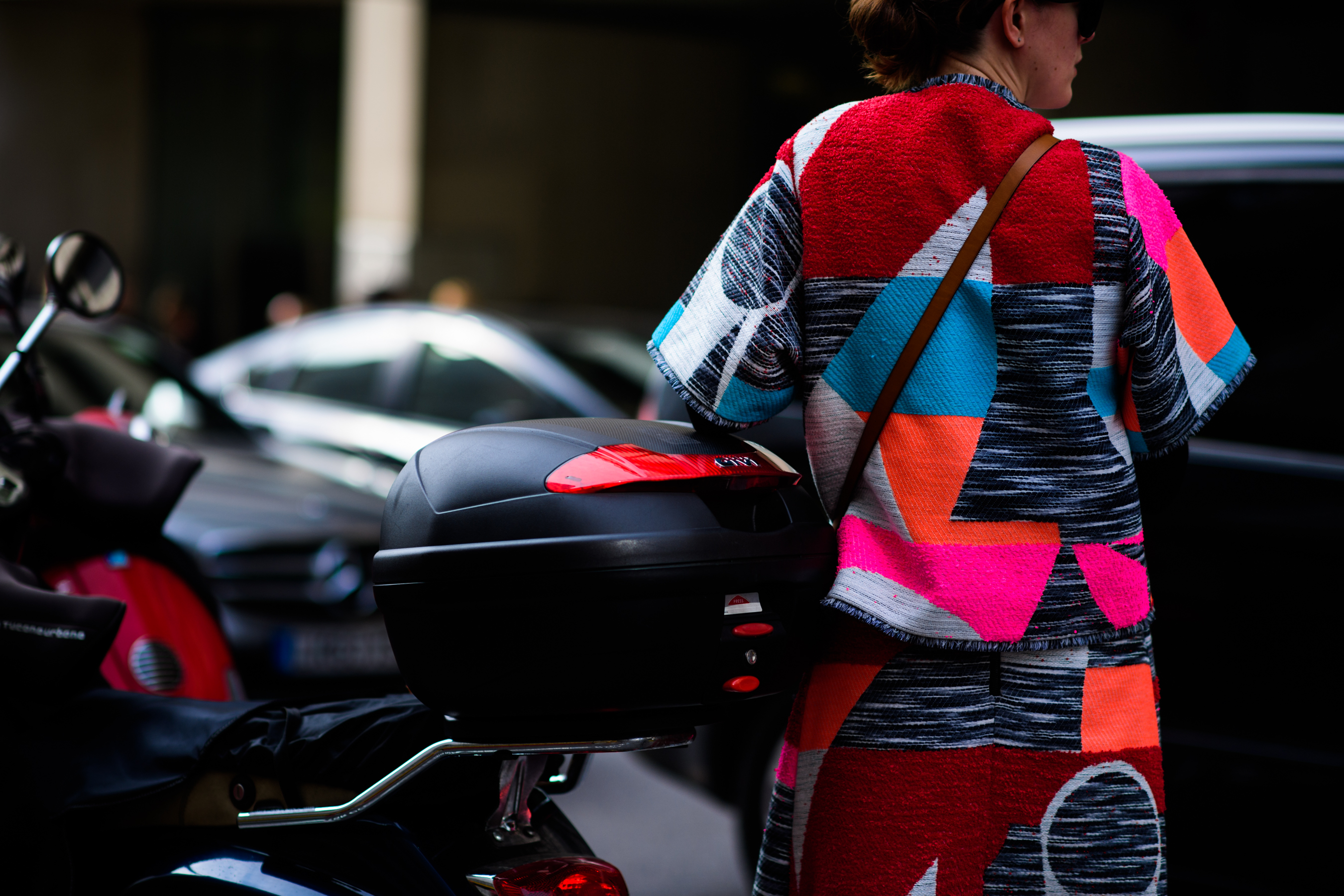 Woman around the bike after the show