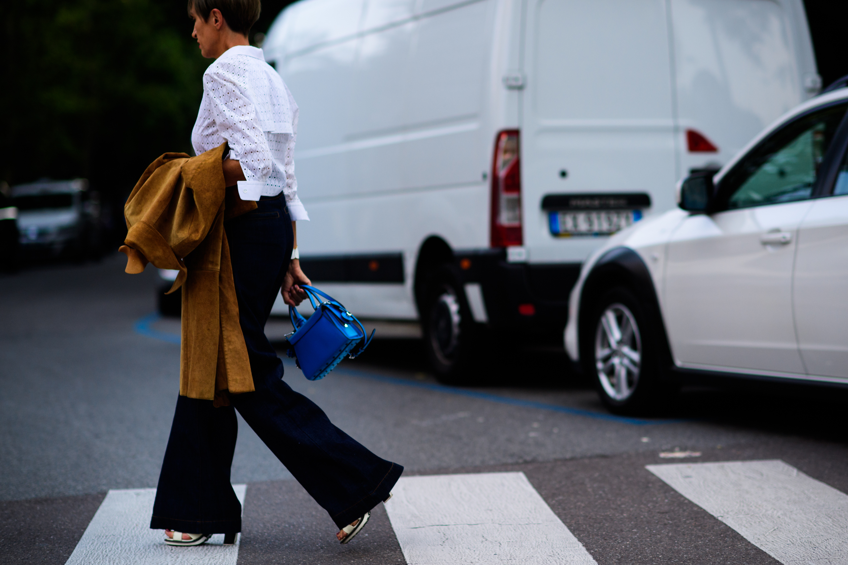 Woman with blue hand bag