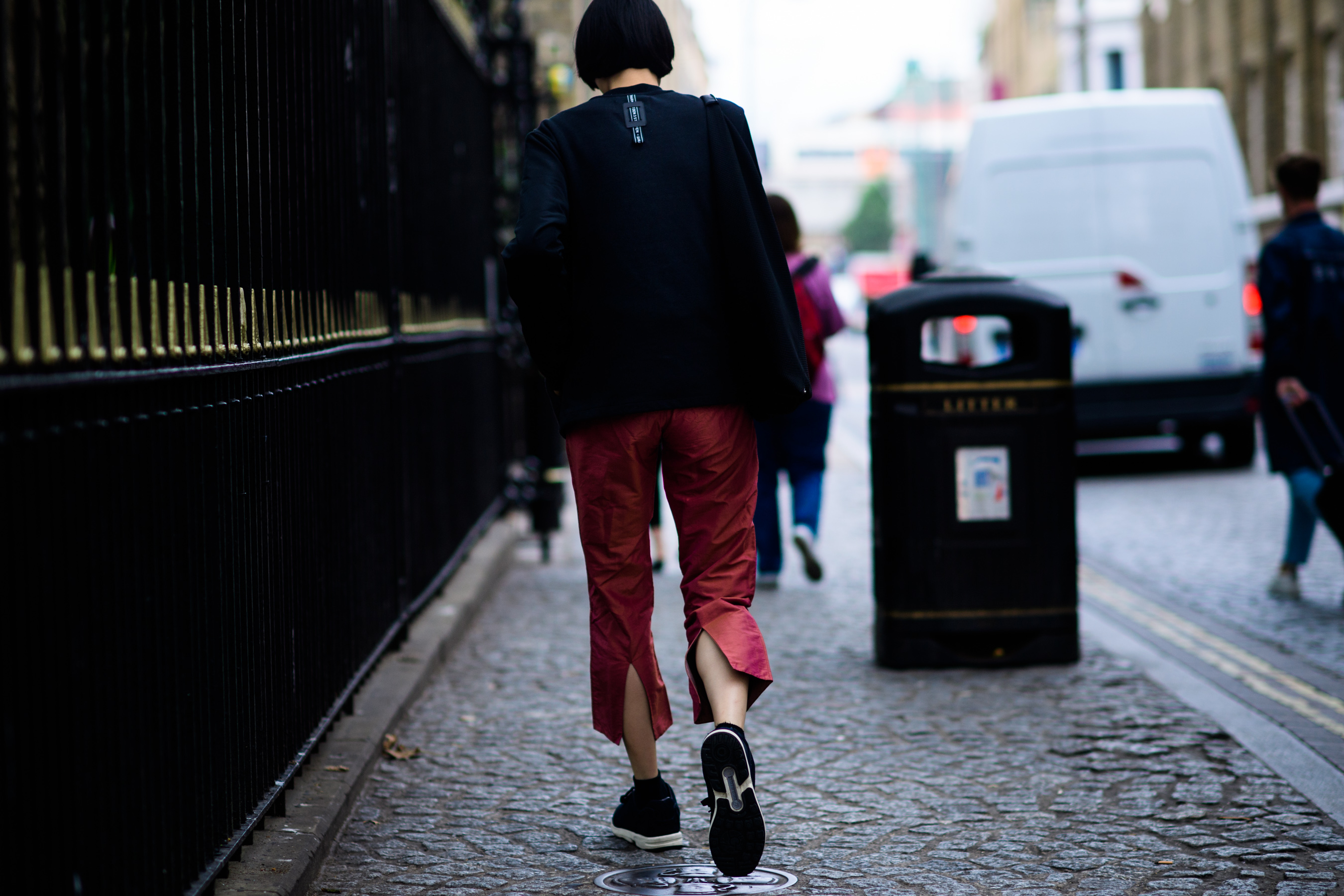 Woman wearing red capri pants